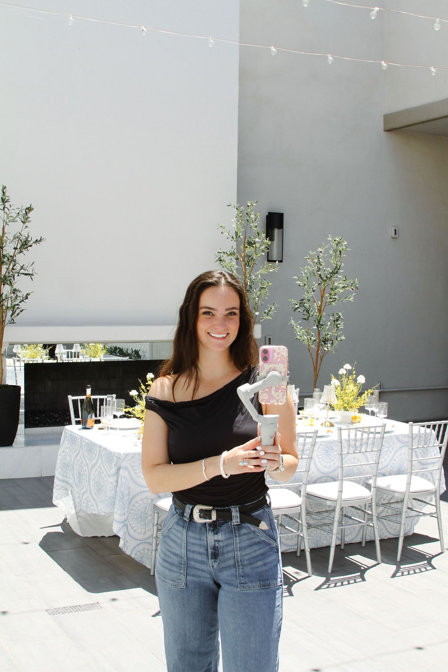 Photo of owner Claire Edington at a styled wedding shoot