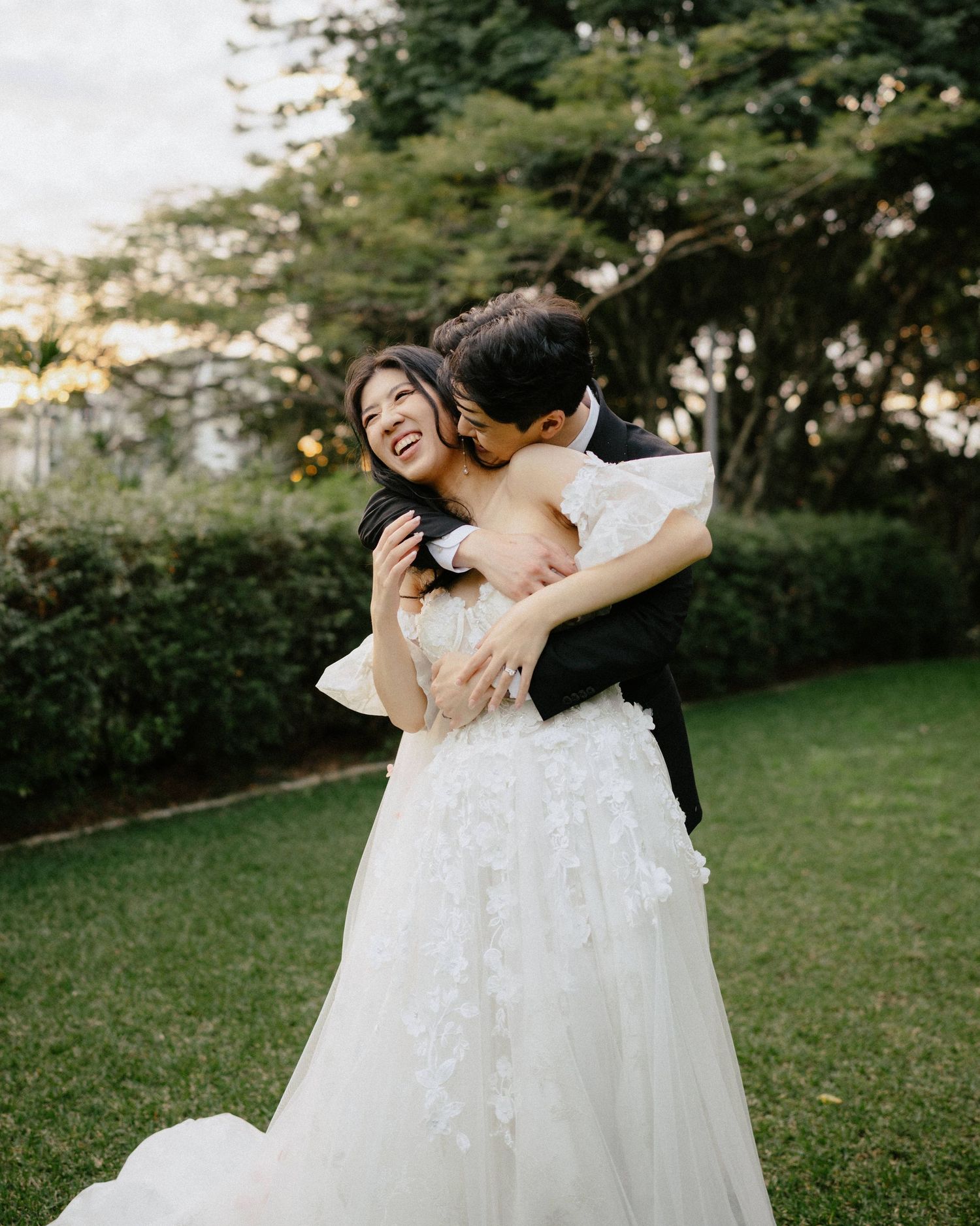 “Love and joy at Roma Street Park wedding, captured by a Brisbane wedding photographer.”