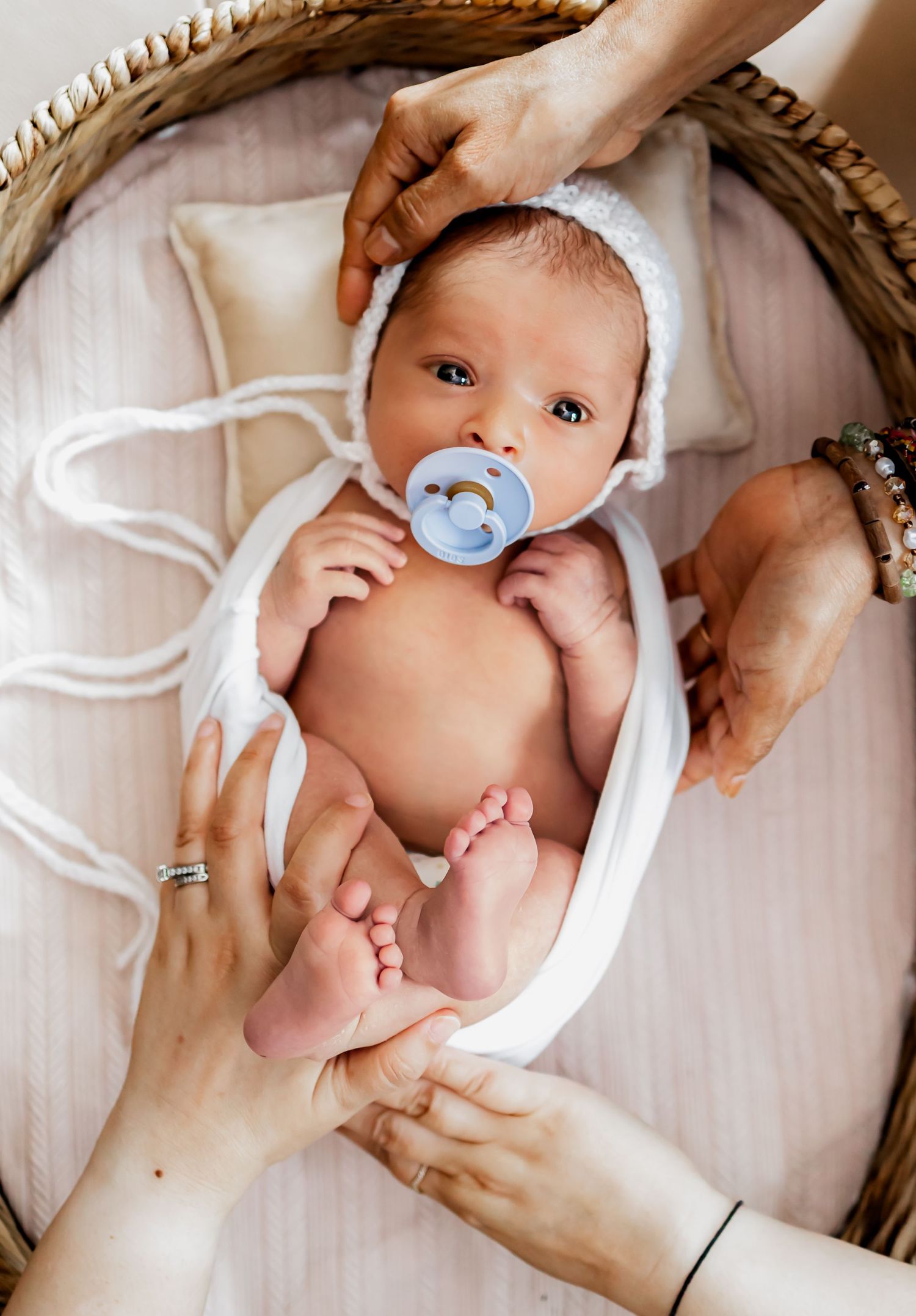 Newborn photographer in Richmond, Virginia. Maternity photographer near Richmond RVA. Baby Wrapped newborn session in studio
