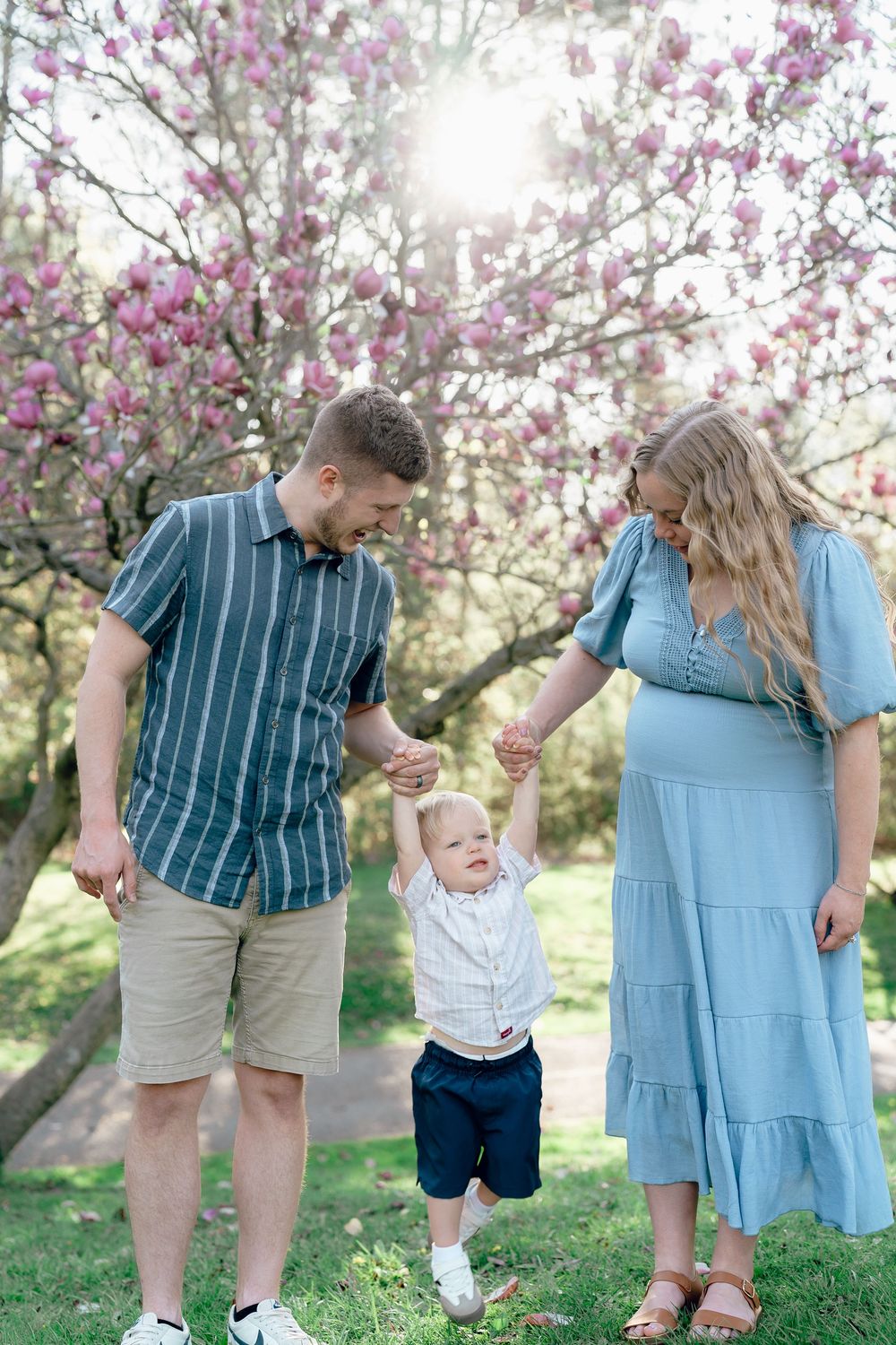 Three joyful photos in a cherry blossom garden showing precious family moments during springtime at F.A. Seiberling Nature Realm, Akron, OH