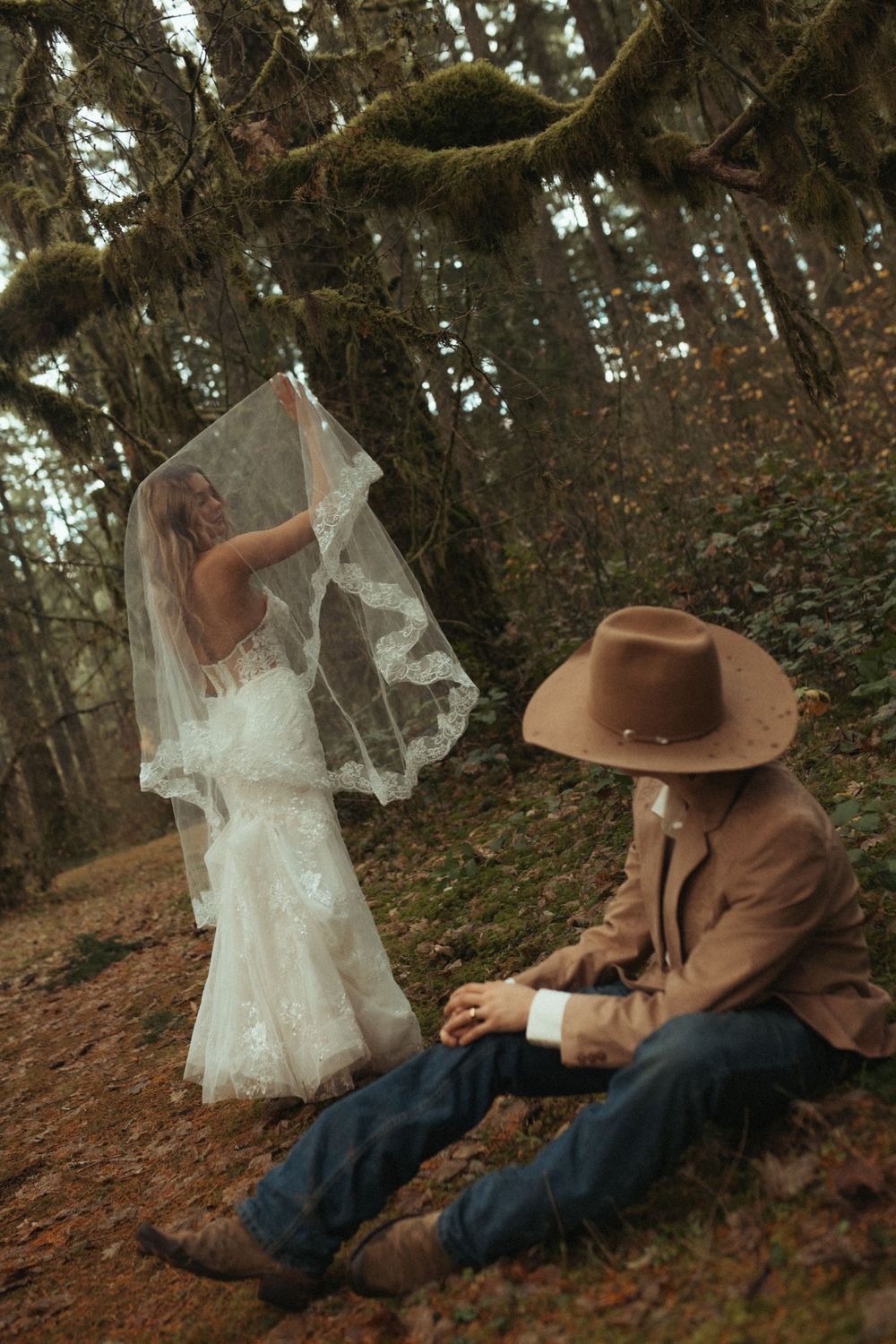 A sequence of images showing a ghostly white fabric floating near a person in a brown hat sitting against a tree in the forest.