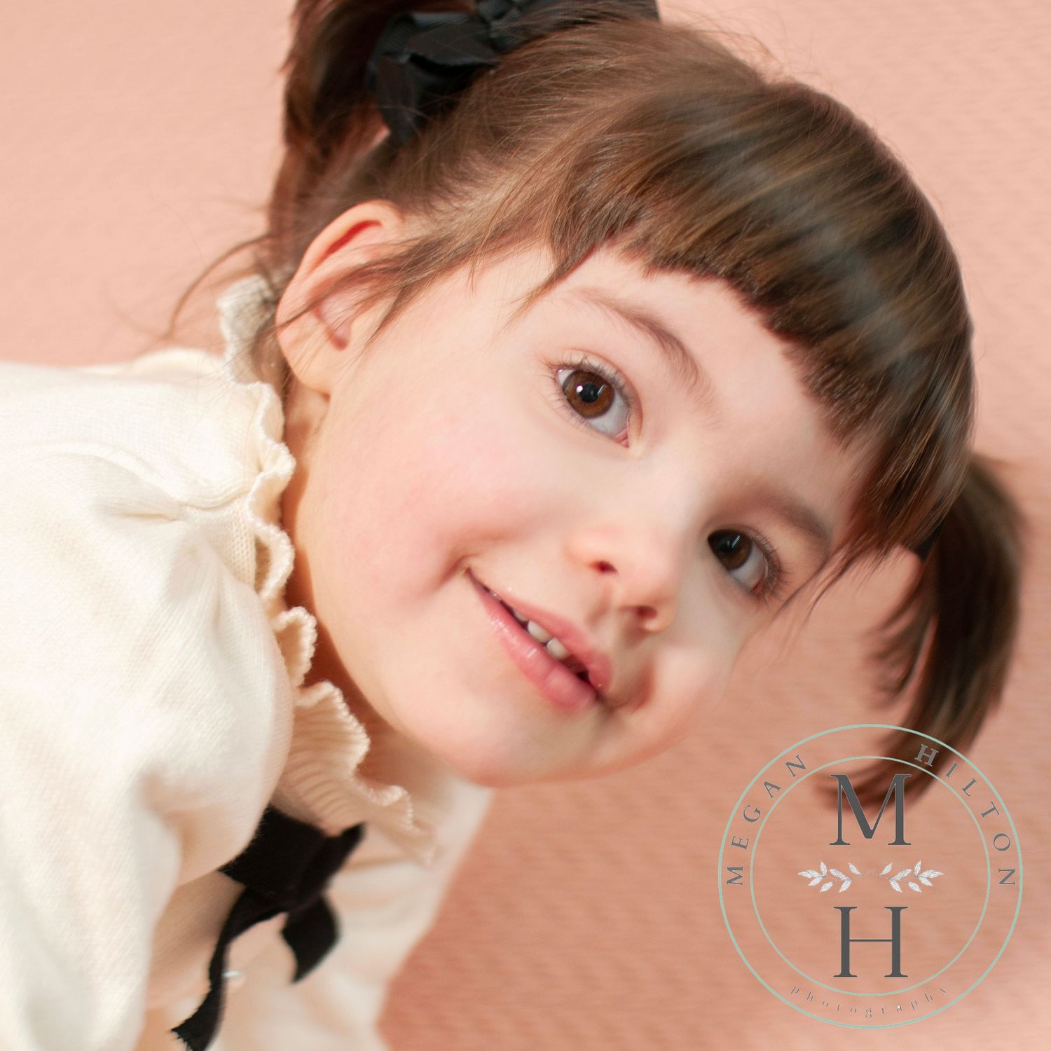 Personality photo of young girl on peach backdrop