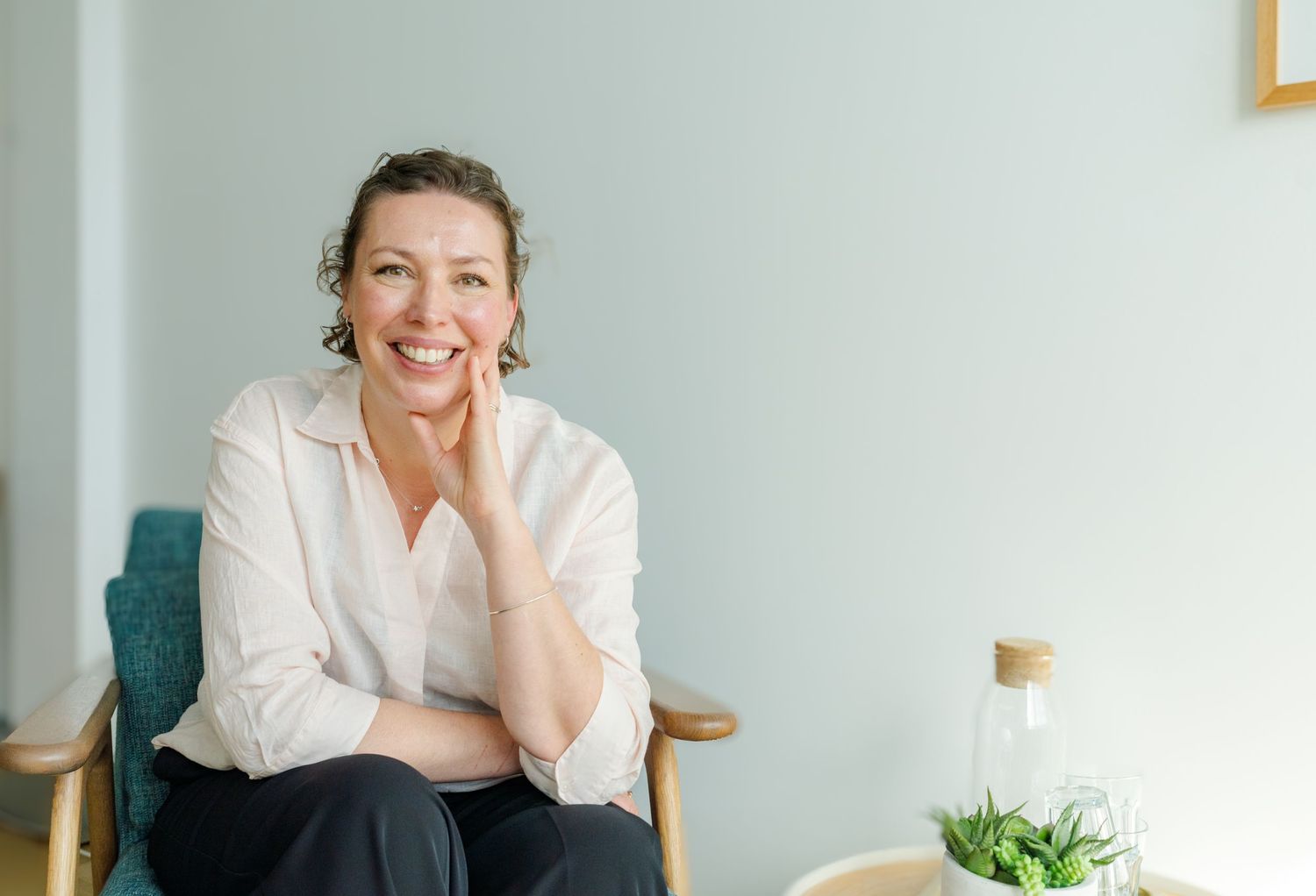 Relaxed portrait of a female business owner in natural light during a branding shoot in Kent