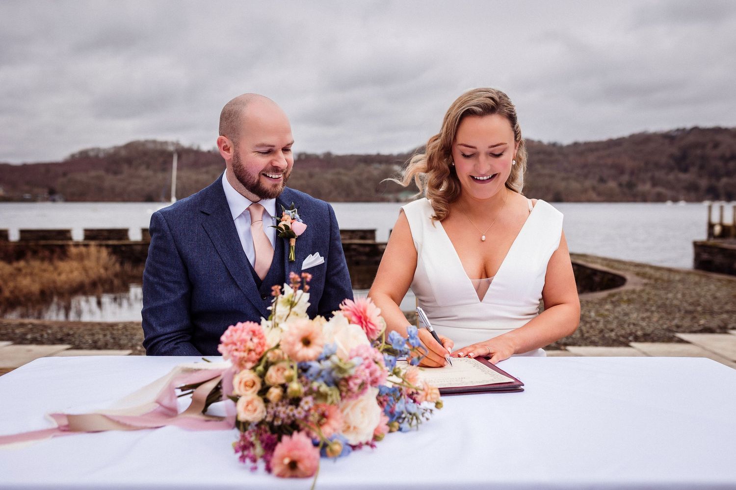 Signing the register during a Storrs Hall elopement