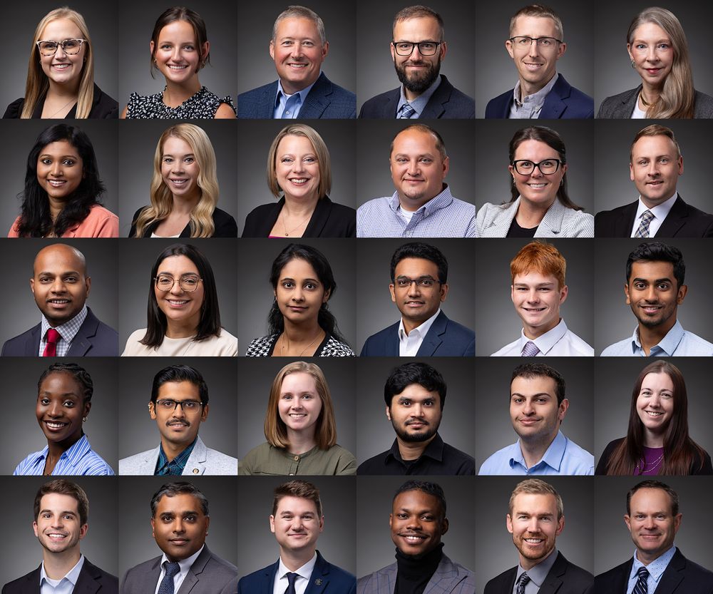 Collection of corporate headshots arranged in rows showing team members in professional attire.