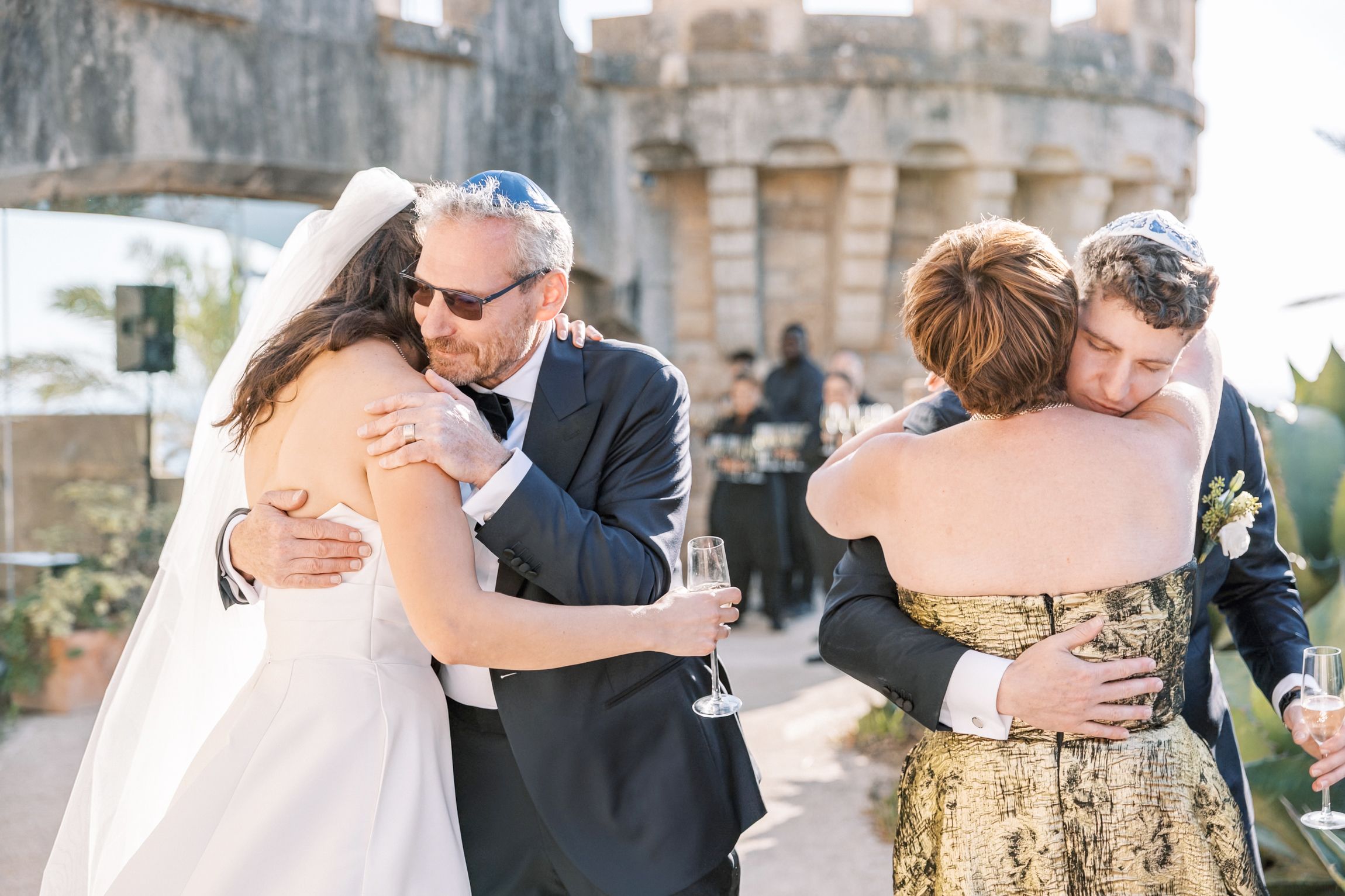 family congrating the happy couple after the wedding ceremony in Cascais Portugal