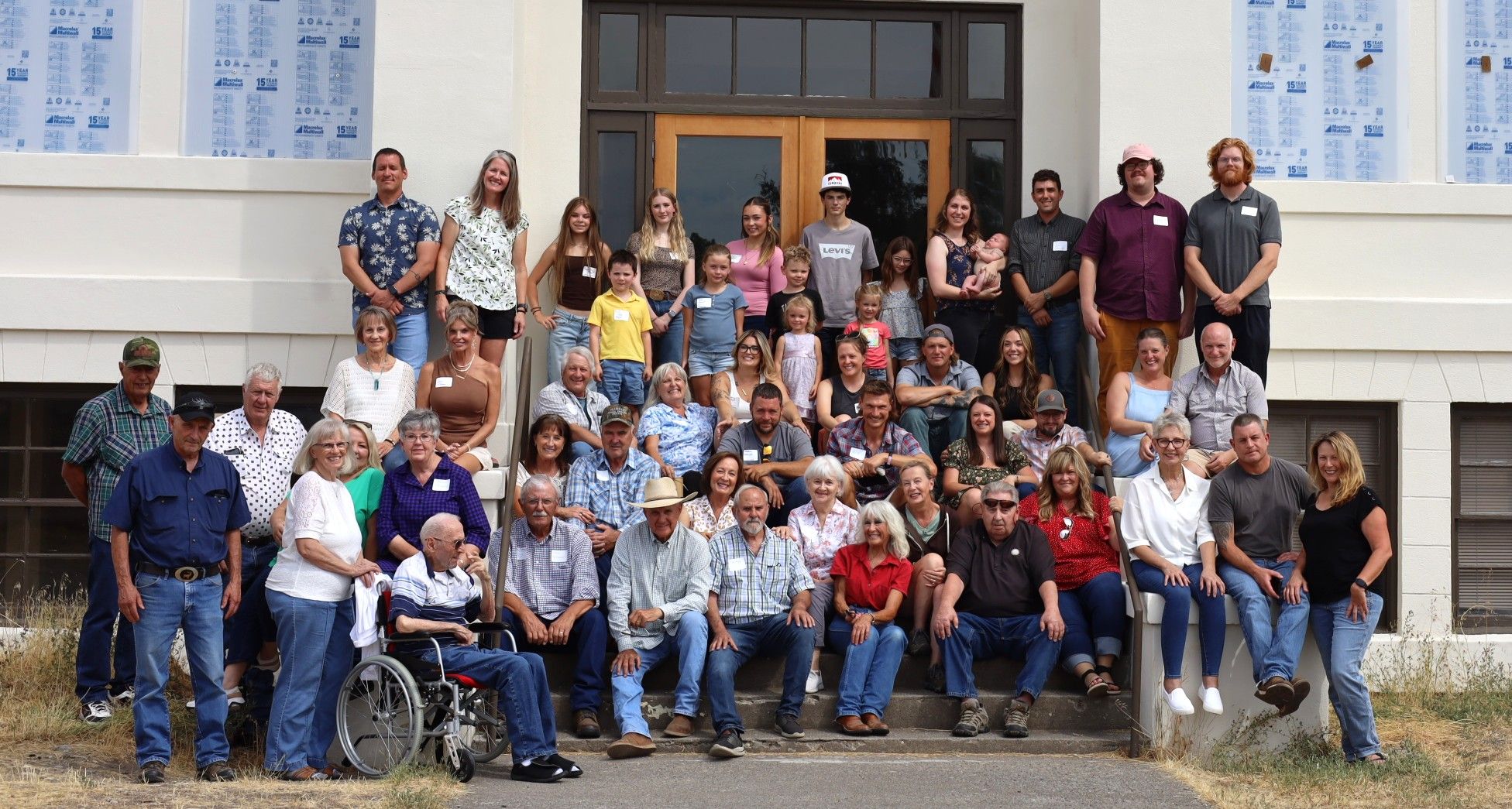 A series of group photos arranged in a horizontal strip showing people sitting together on outdoor steps and benches.
