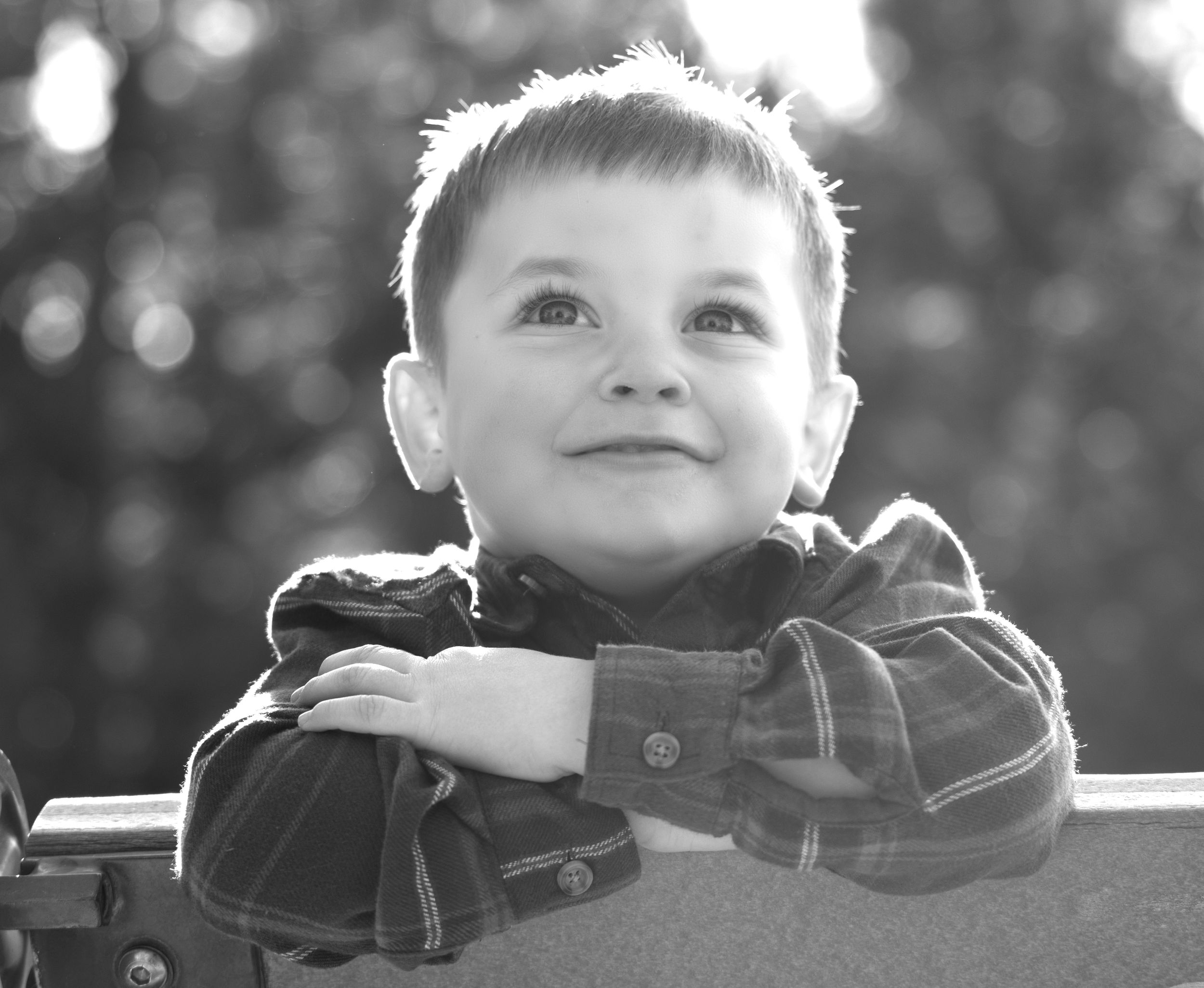 Black and white close-up portrait series showing natural expressions and emotions.