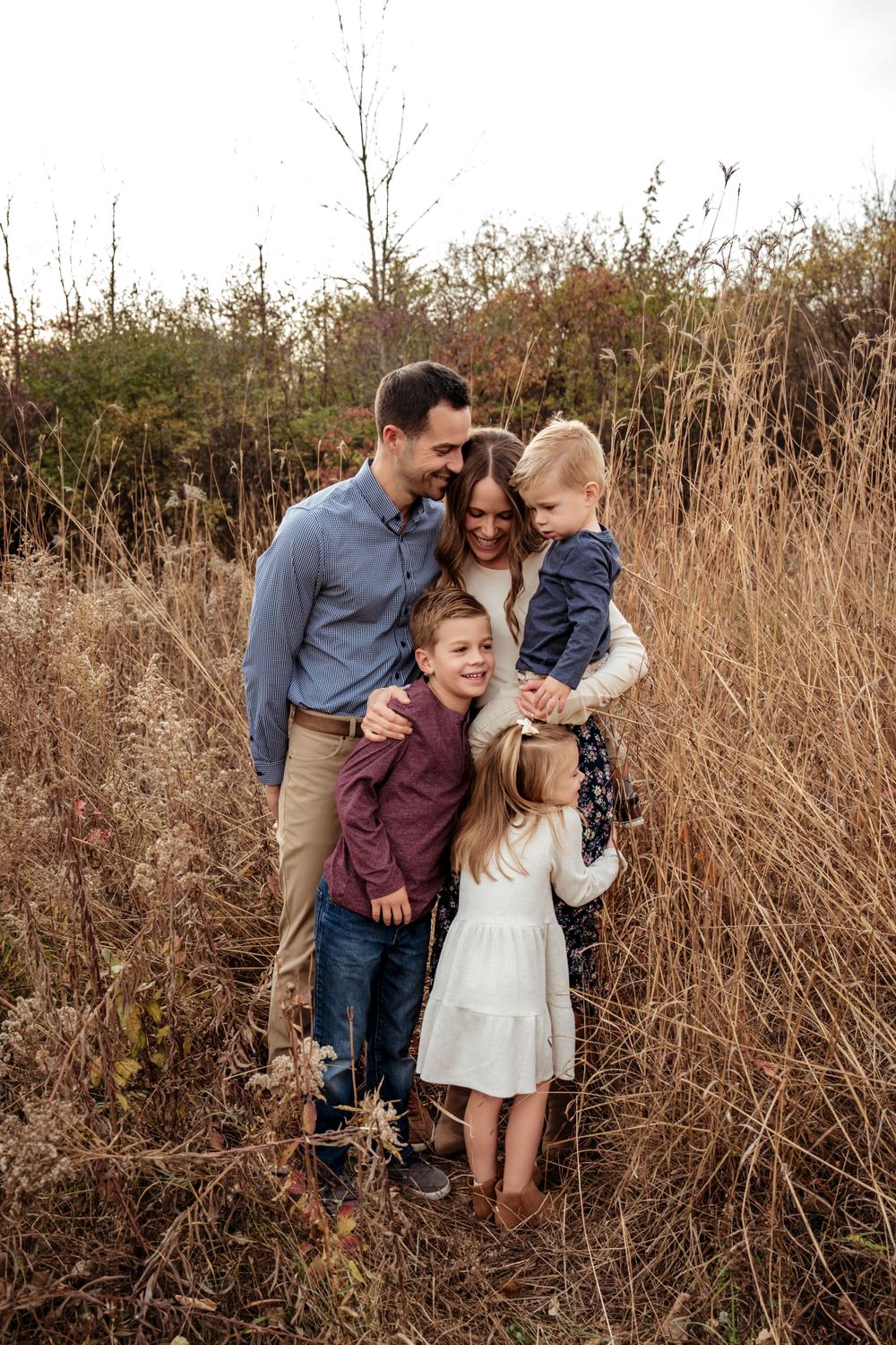 fall family pictures in a field