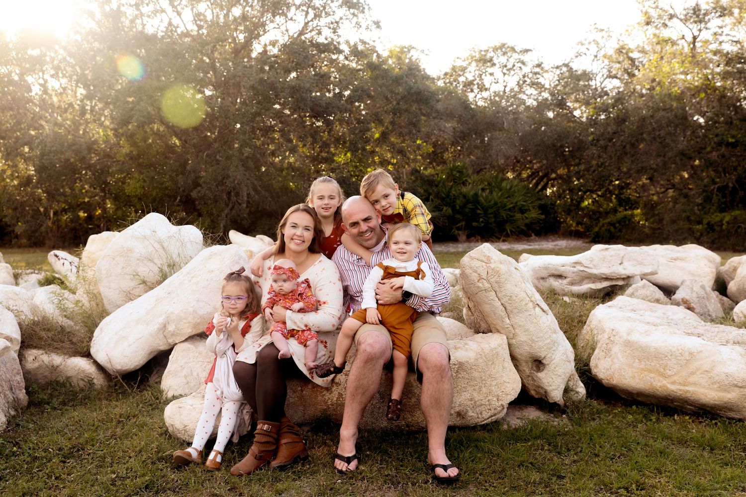 Sunlit Family Portrait on White Rocks | Artistic Outdoor Lifestyle Photography with Natural Light