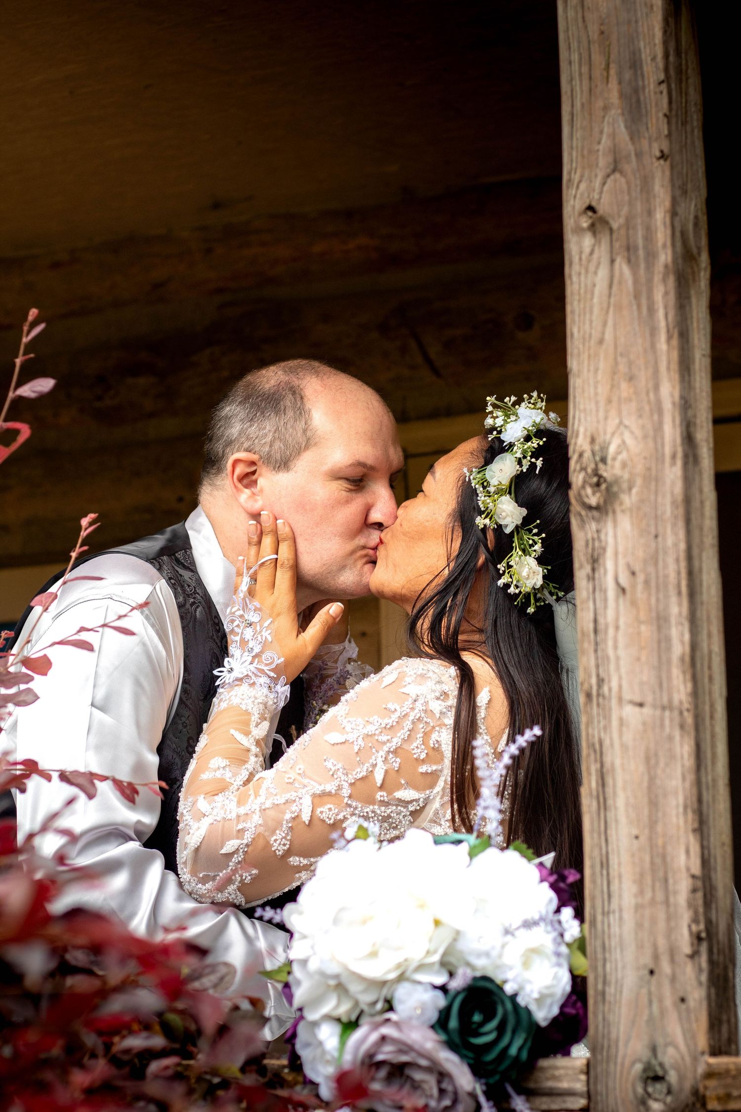 Couple sharing a kiss during their wedding portrait session with Tay Portraits the best Chattanooga wedding photographer