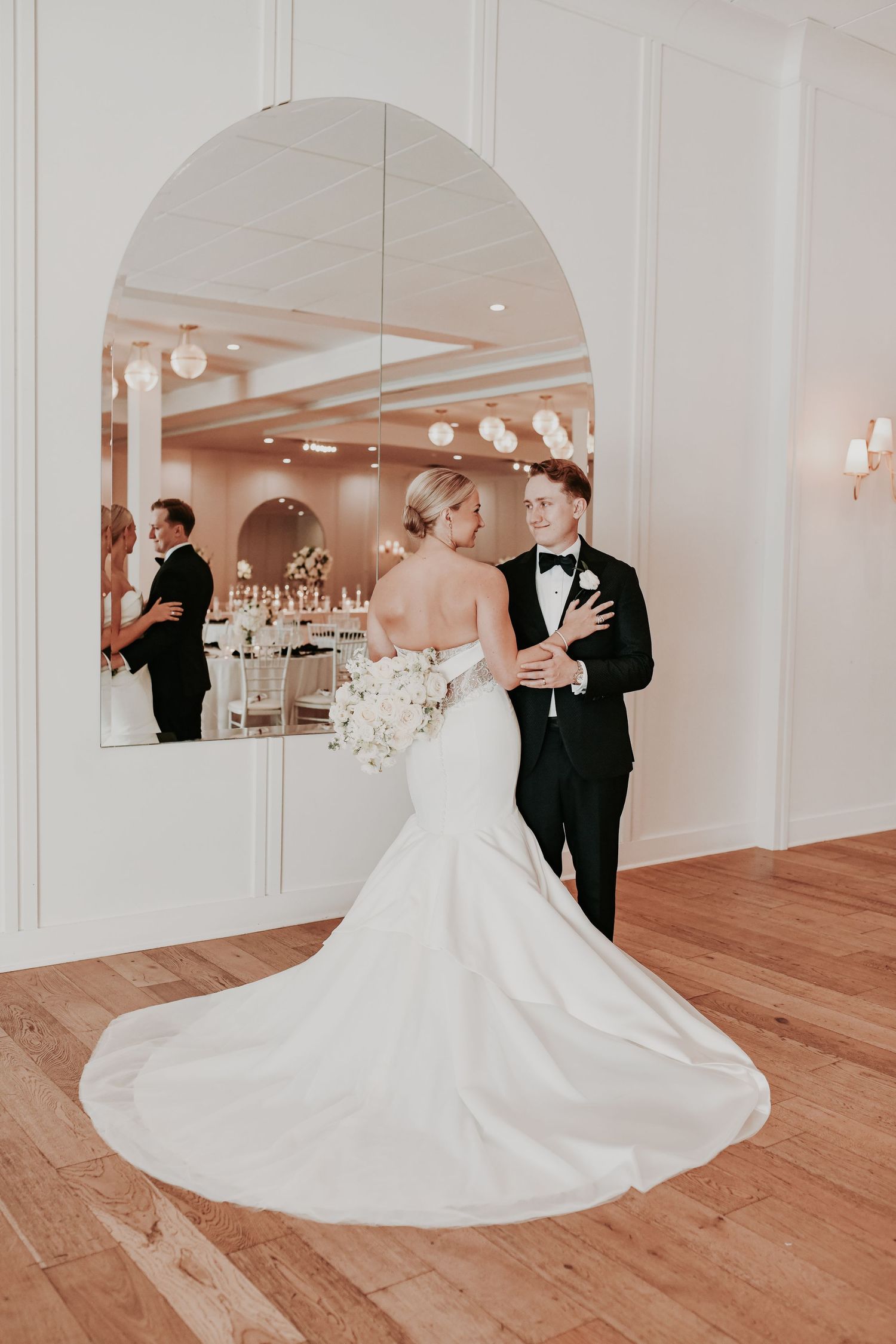 Newlyweds celebrating during their Dallas wedding reception entrance