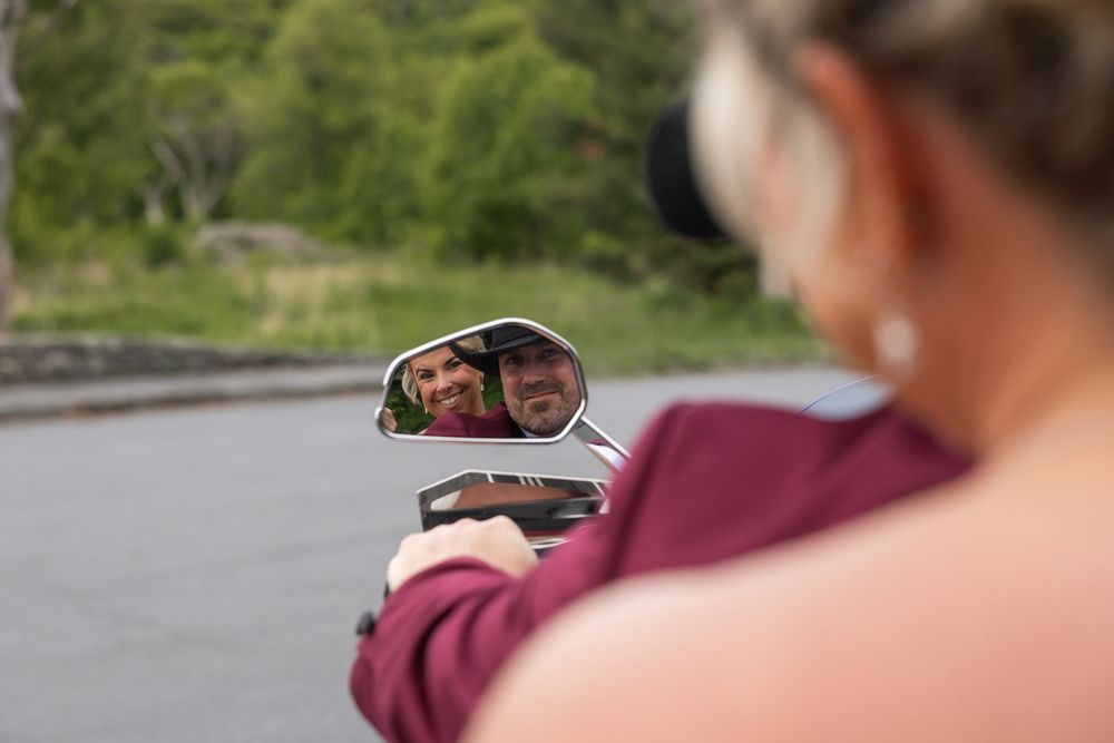 Bride and groom reflected in a motorcycle side mirror on Skyline Drive in Shenandoah National Park.