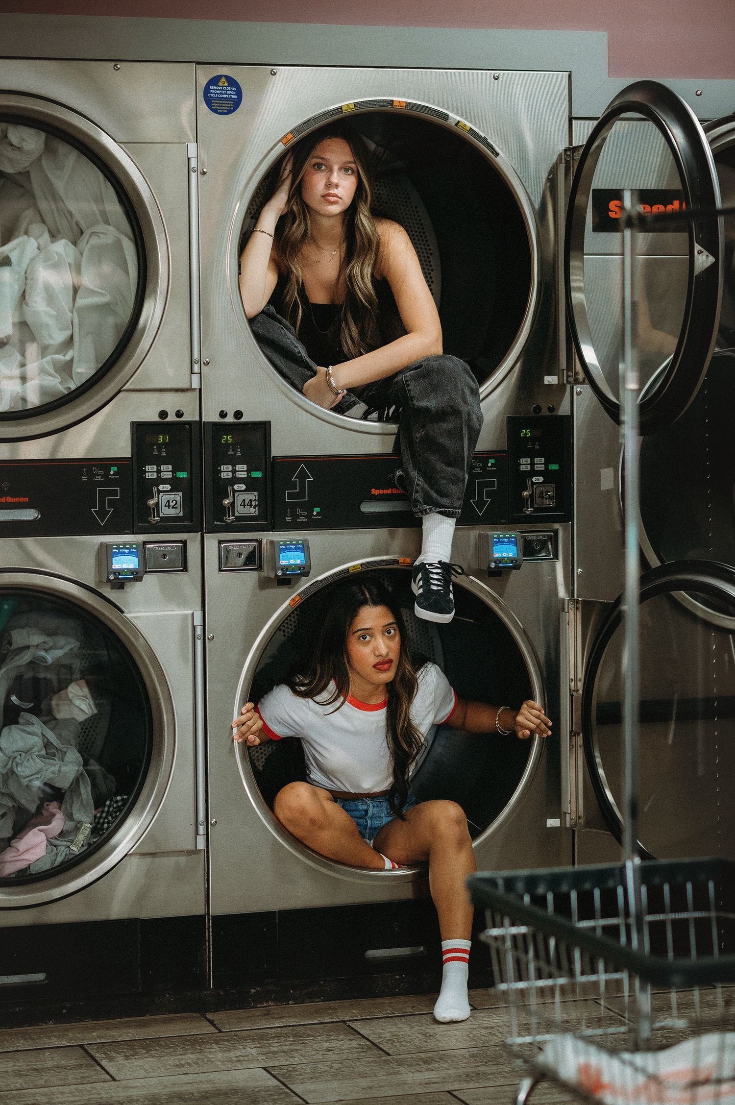2 girls in laundromat dryers in orlando