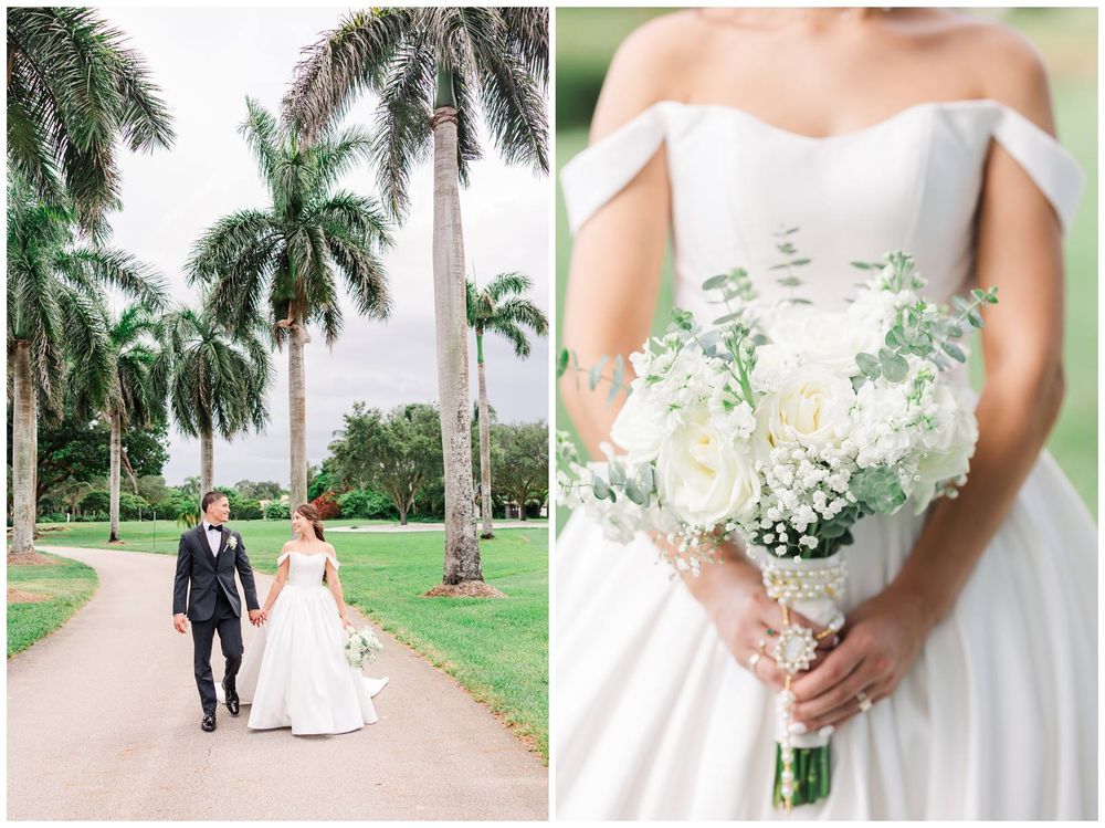 Bride holding white floral bouquet with roses and eucalyptus walks with groom along palm tree-lined path at wedding.