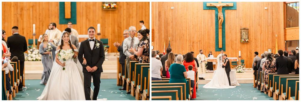 Bride and groom walking down the aisle of a wooden church during wedding ceremony.