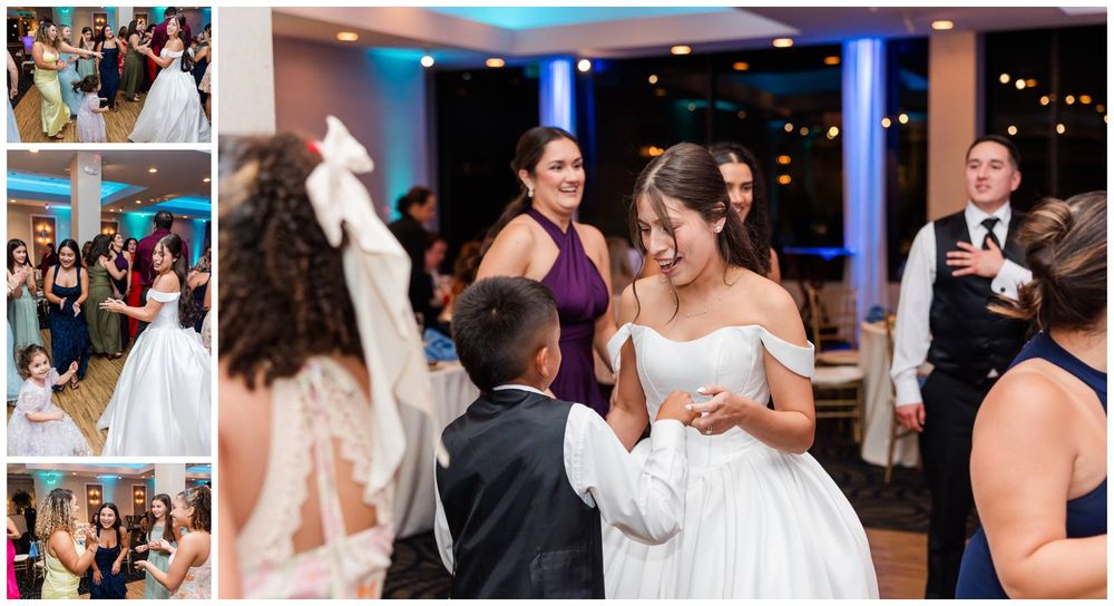Bride laughing and dancing joyfully with wedding guests on the dance floor during lively wedding reception celebration.