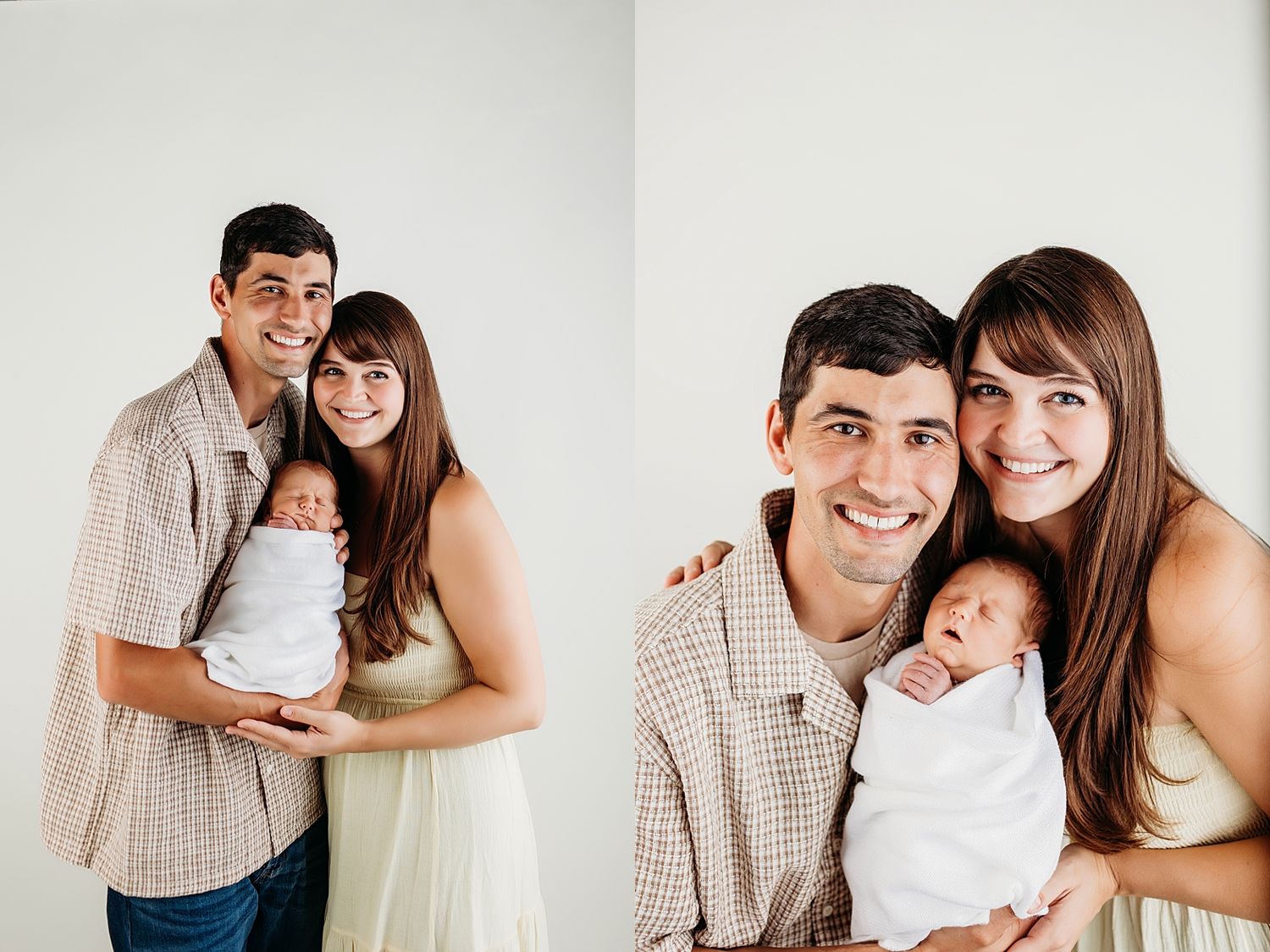 Happy couple smiling and holding their newborn baby wrapped in white, posed for a portrait photo.