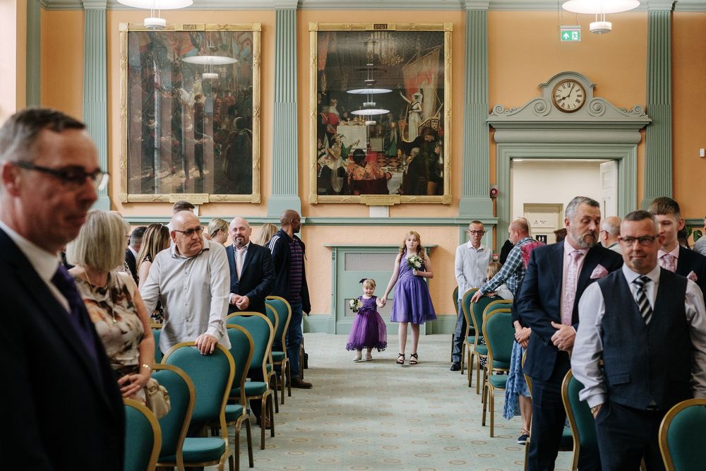Guests gather in an a wedding at Corn Street Registry Office Wedding, Bristol