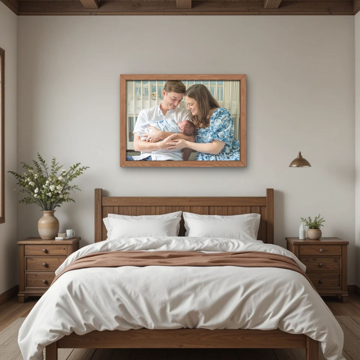 One wooden framed family photos displayed in a River Oaks home in Houston TX. Showing a family welcoming a newborn, framed in a bedroom.