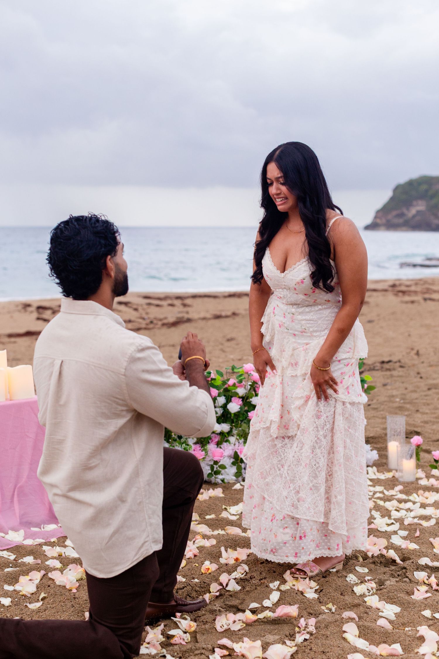 Marriage proposal on the beach with flowers and candles. Playa Guajataca, Isabela, Puerto Rico.