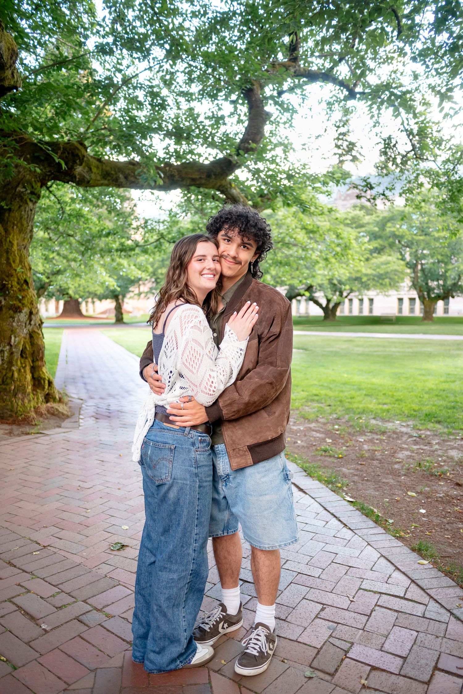 University of Washington graduate with her boyfriend in the UW Quad