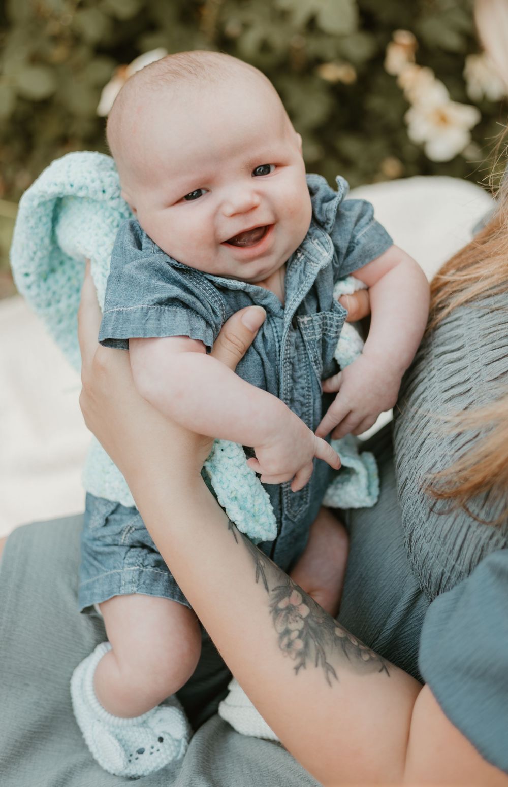 baby smiling during family session
