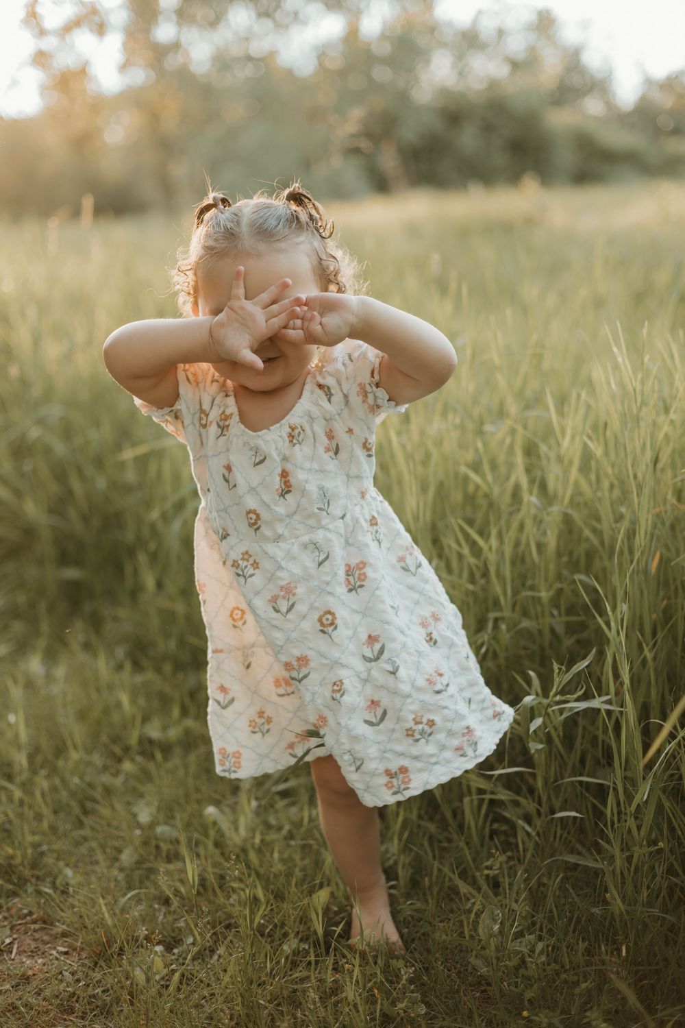 playful girl golden hour