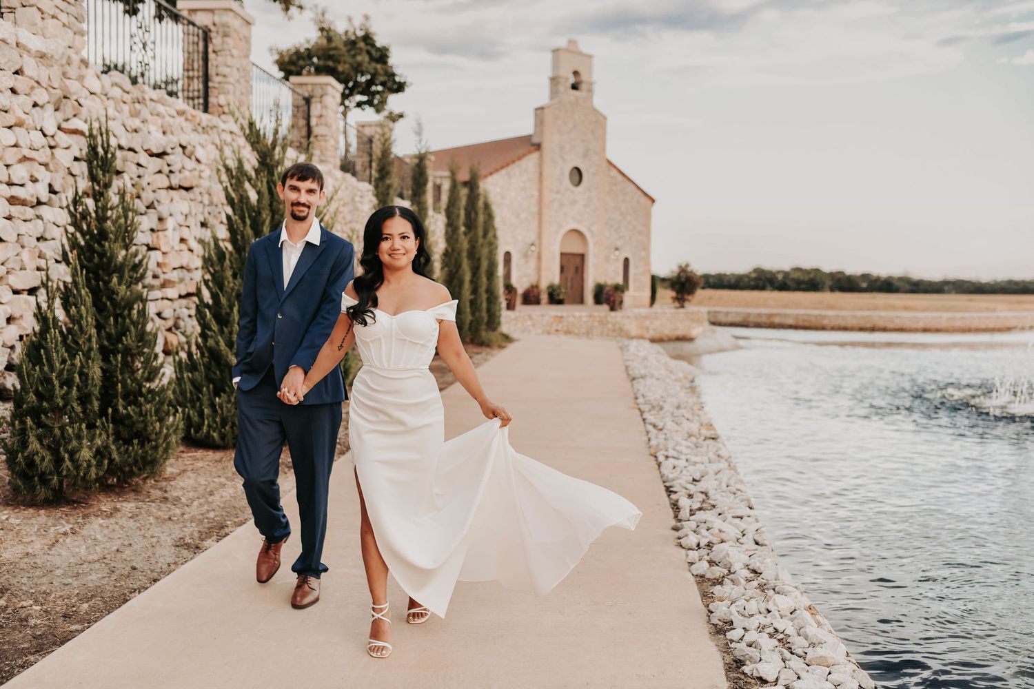 Romantic Chapel at Palacios engagement photos with a couple dressed in elegant white and navy