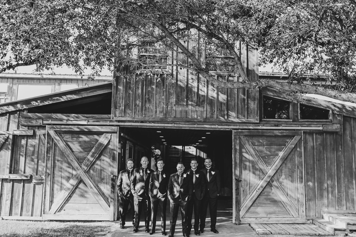 Rustic formal portrait of the groom and groomsmen