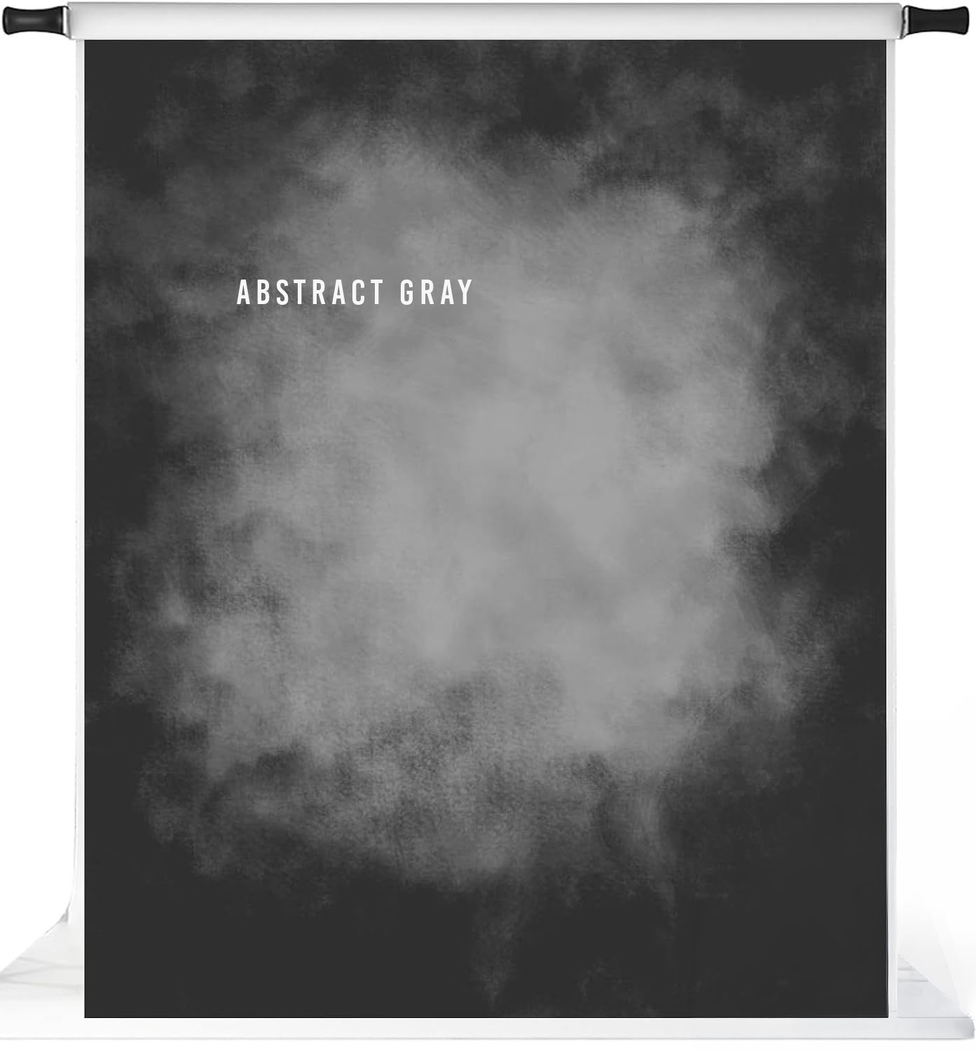 Abstract gray photography backdrop with dark edges and a soft, misty light center for professional photo shoots.