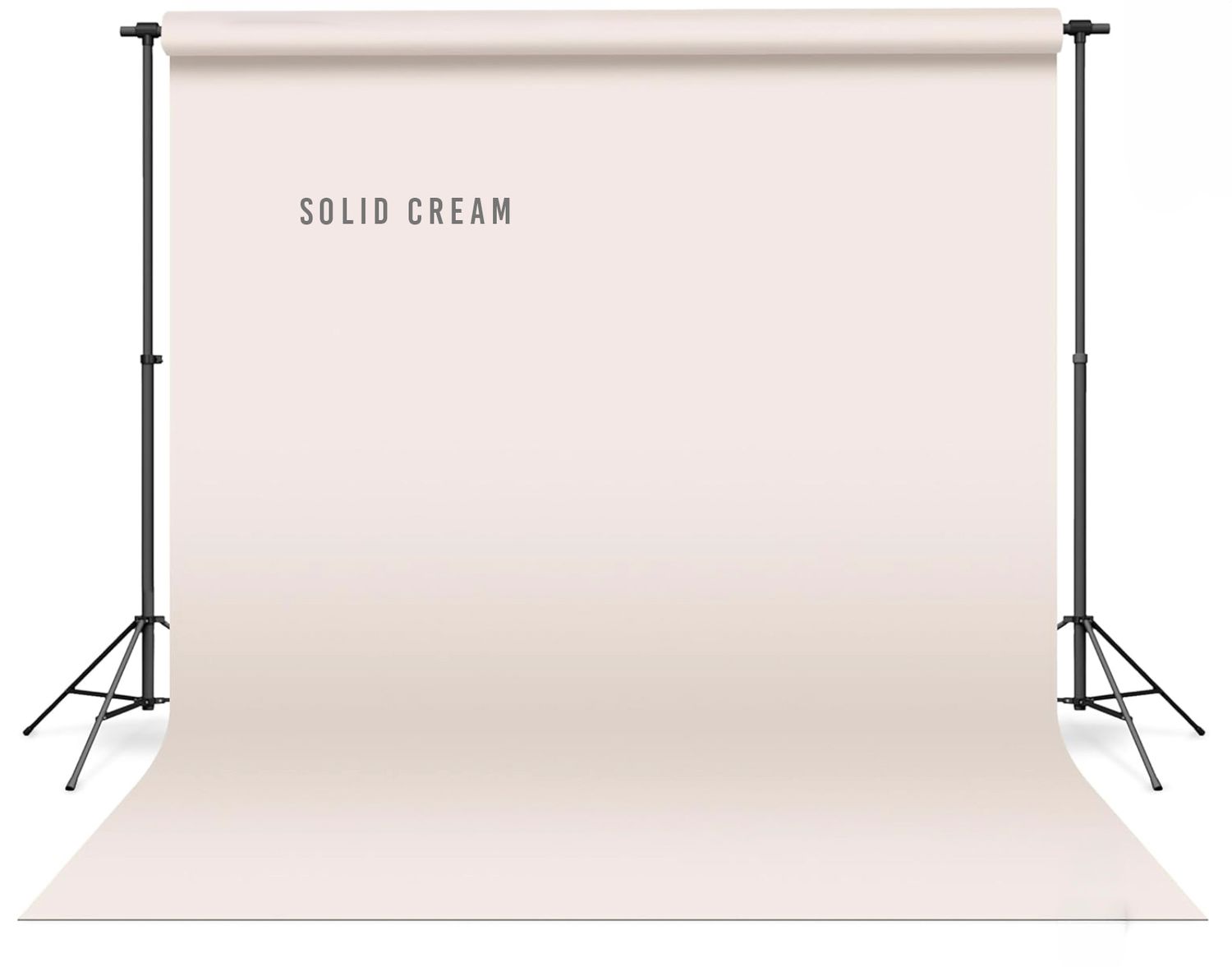 Solid cream photography backdrop on adjustable stand, perfect for portraits and product photography.
