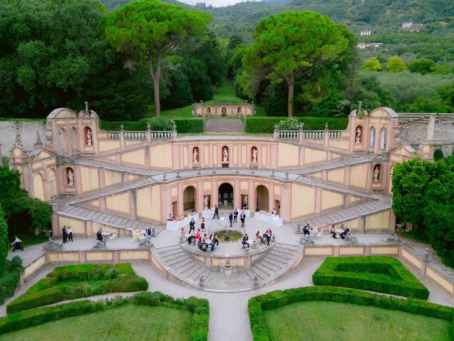 Cocktail time at the marvelous monumental garden of Villa Bettoni, Lake Garda, Italy