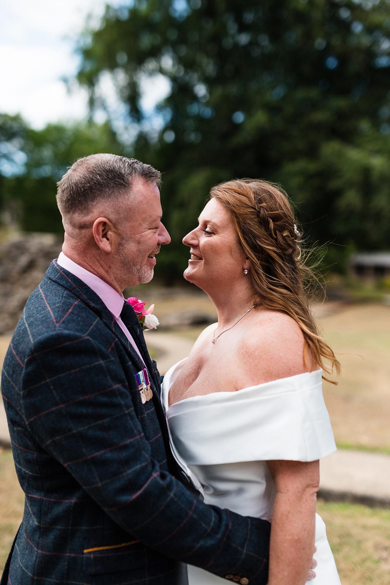 Natural wedding photograph at Dudley Register Office in Priory Hall and its grounds
