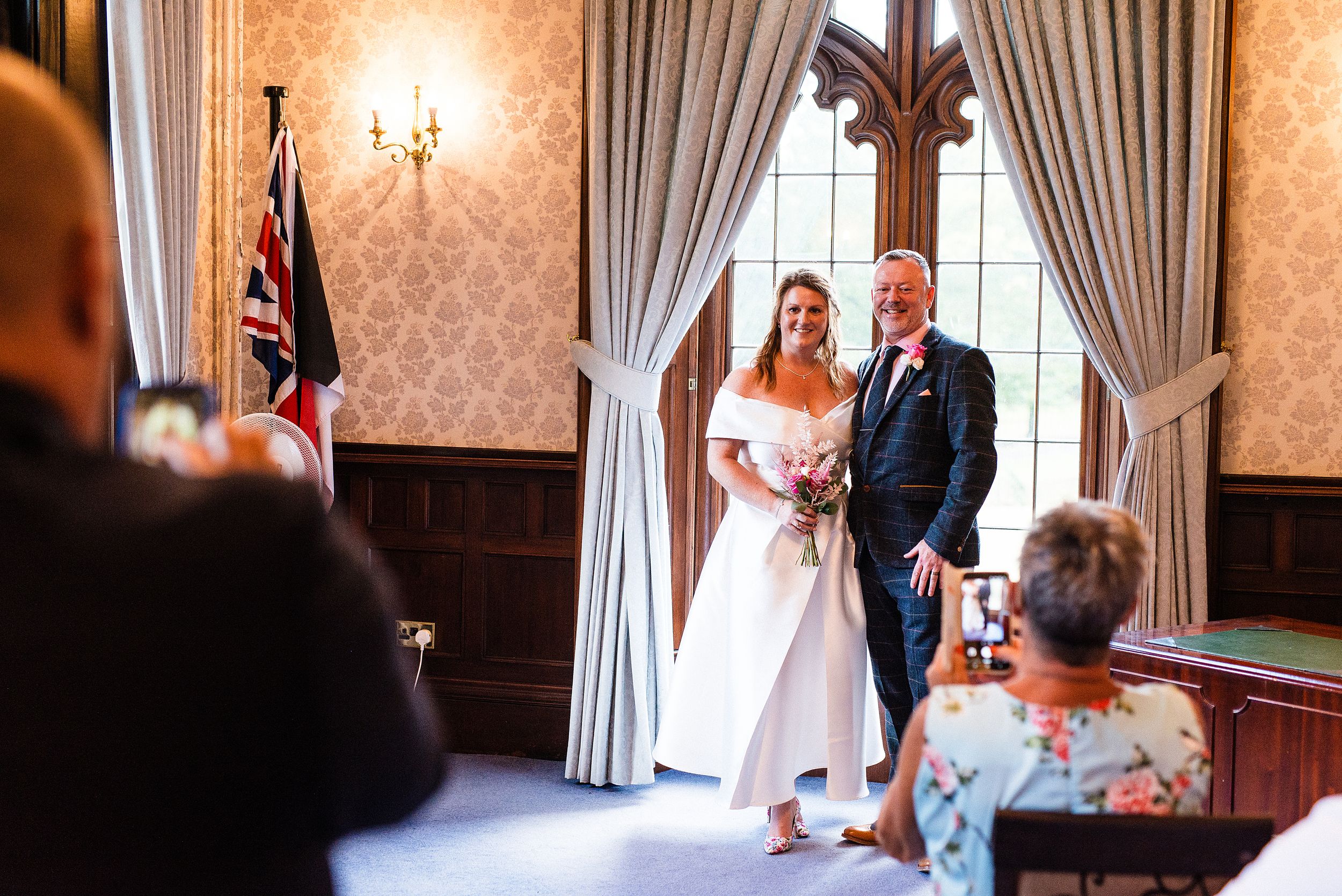 Natural wedding photograph at Dudley Register Office in Priory Hall and its grounds