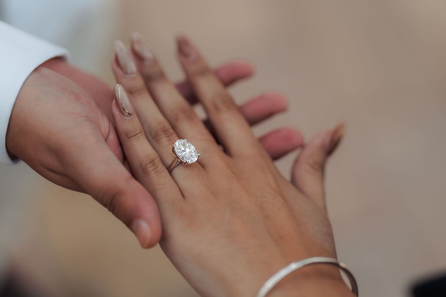 Close-up of an engagement ring on her hand after a surprise proposal in Dubai