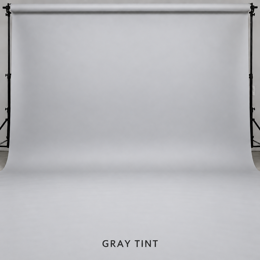 Gray tint seamless paper backdrop on a photography stand, perfect for professional portrait and product photography.