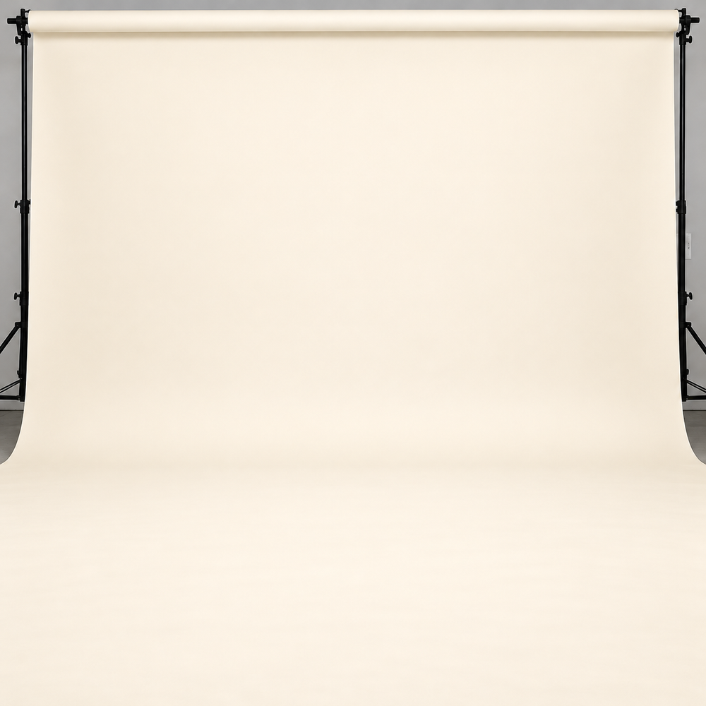 Cream ivory seamless paper backdrop on photography studio stand for professional photo shoots.
