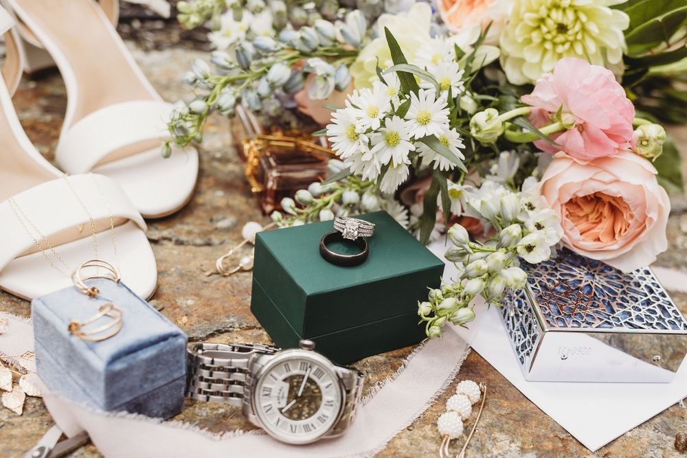 Wedding rings photographed together in a detail flat lay.