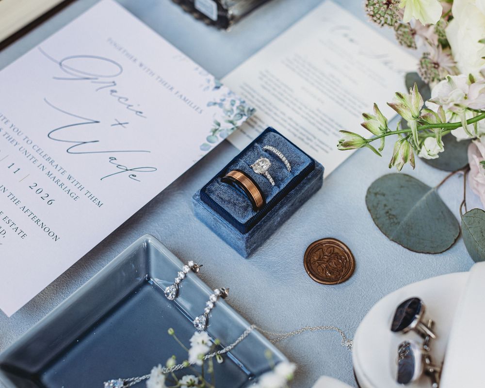Wedding invitation and personal details photographed before getting ready.