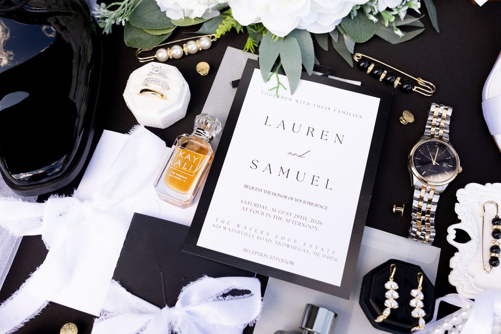 Wedding invitation and personal details photographed before getting ready.
