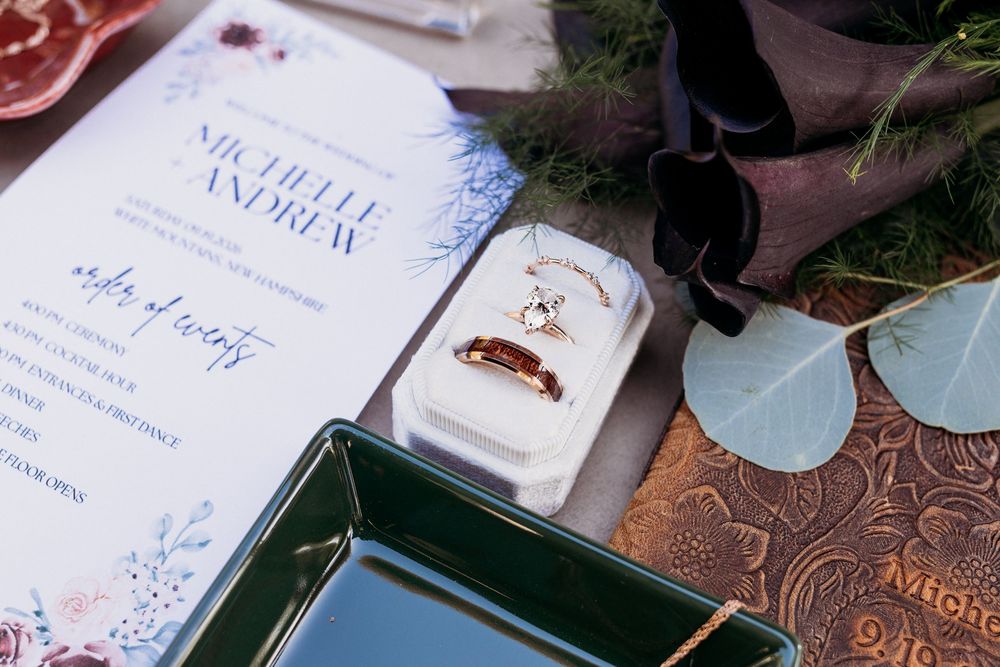 Wedding stationery styled with flowers and meaningful keepsakes.