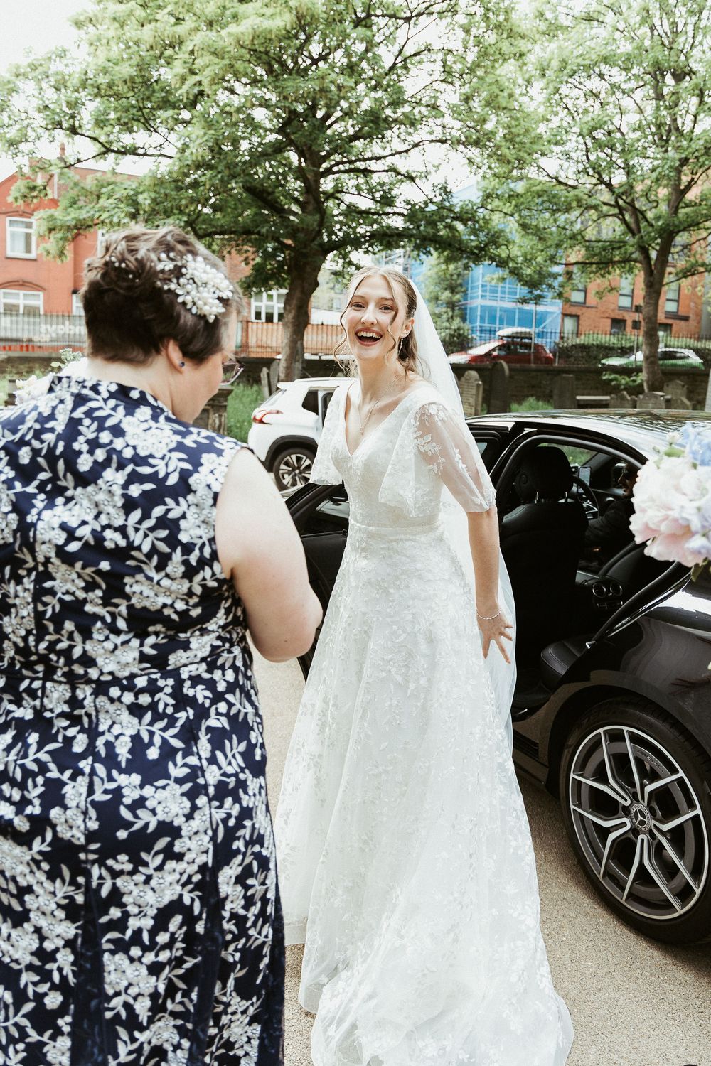 Bride arrival at Leeds Church  by Chelle Lundy Photography