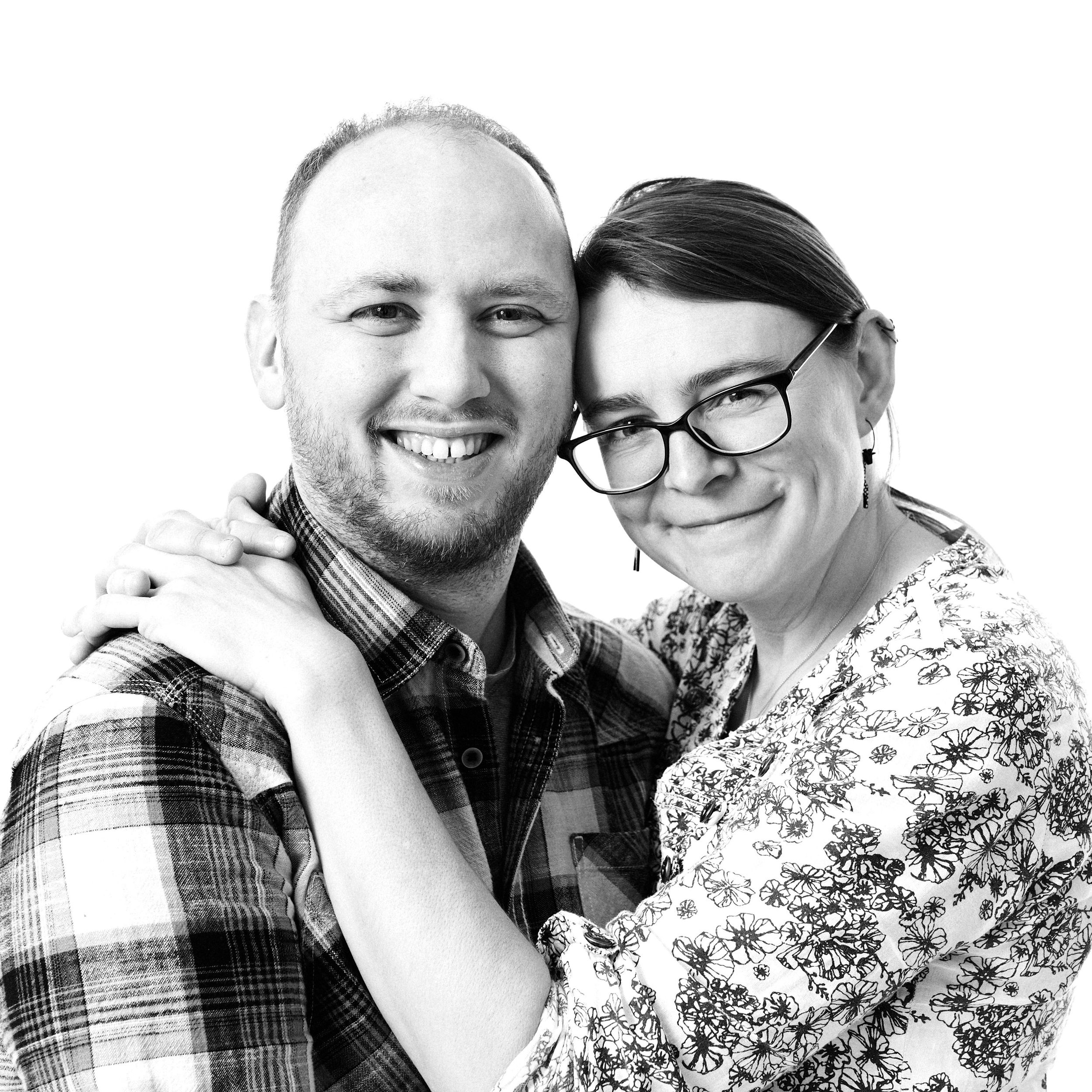 Couple photograph. Black and white images of a happy couple looking at the camrea.