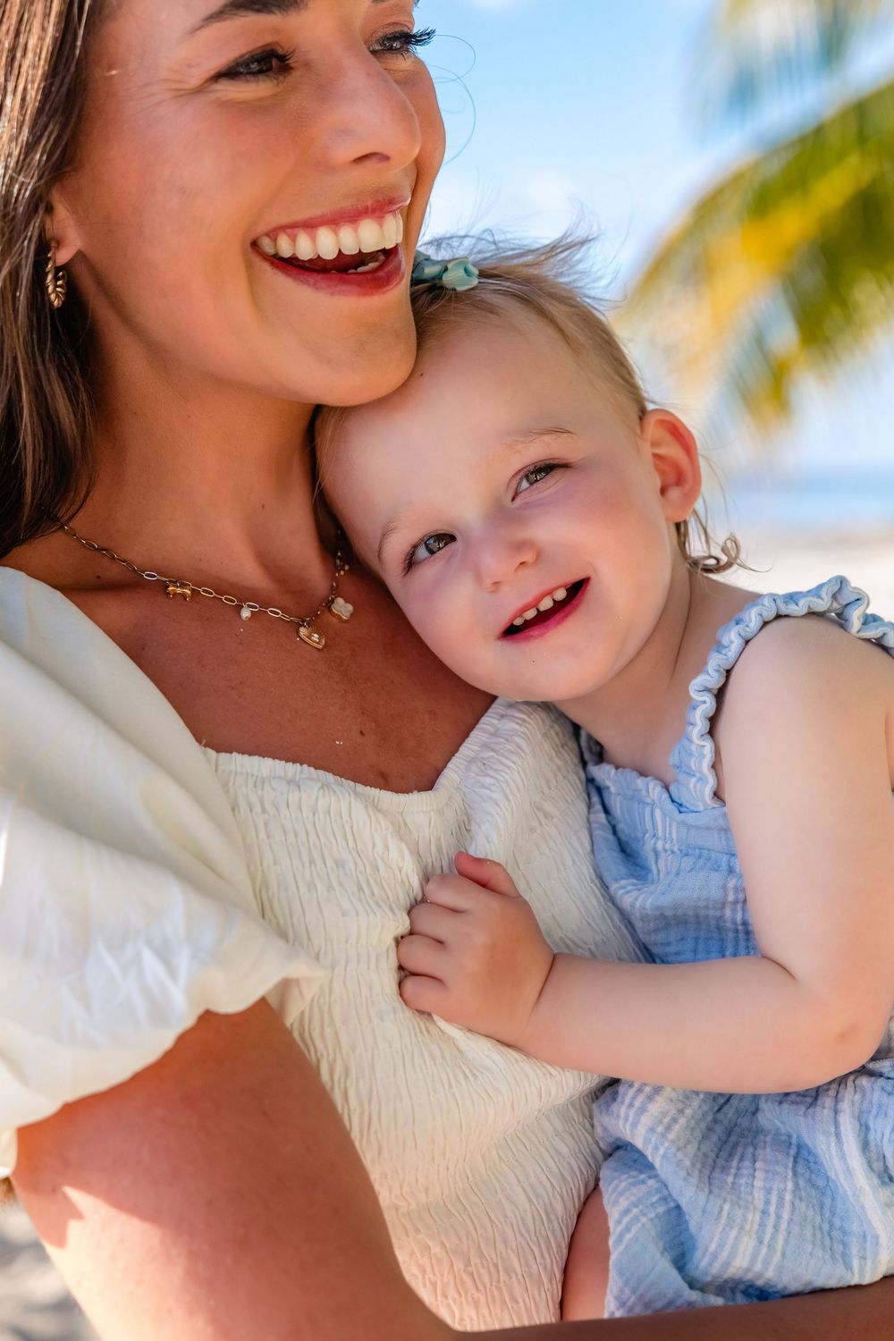 mother and daughter on a sunny beach photoshoot in cozumel
