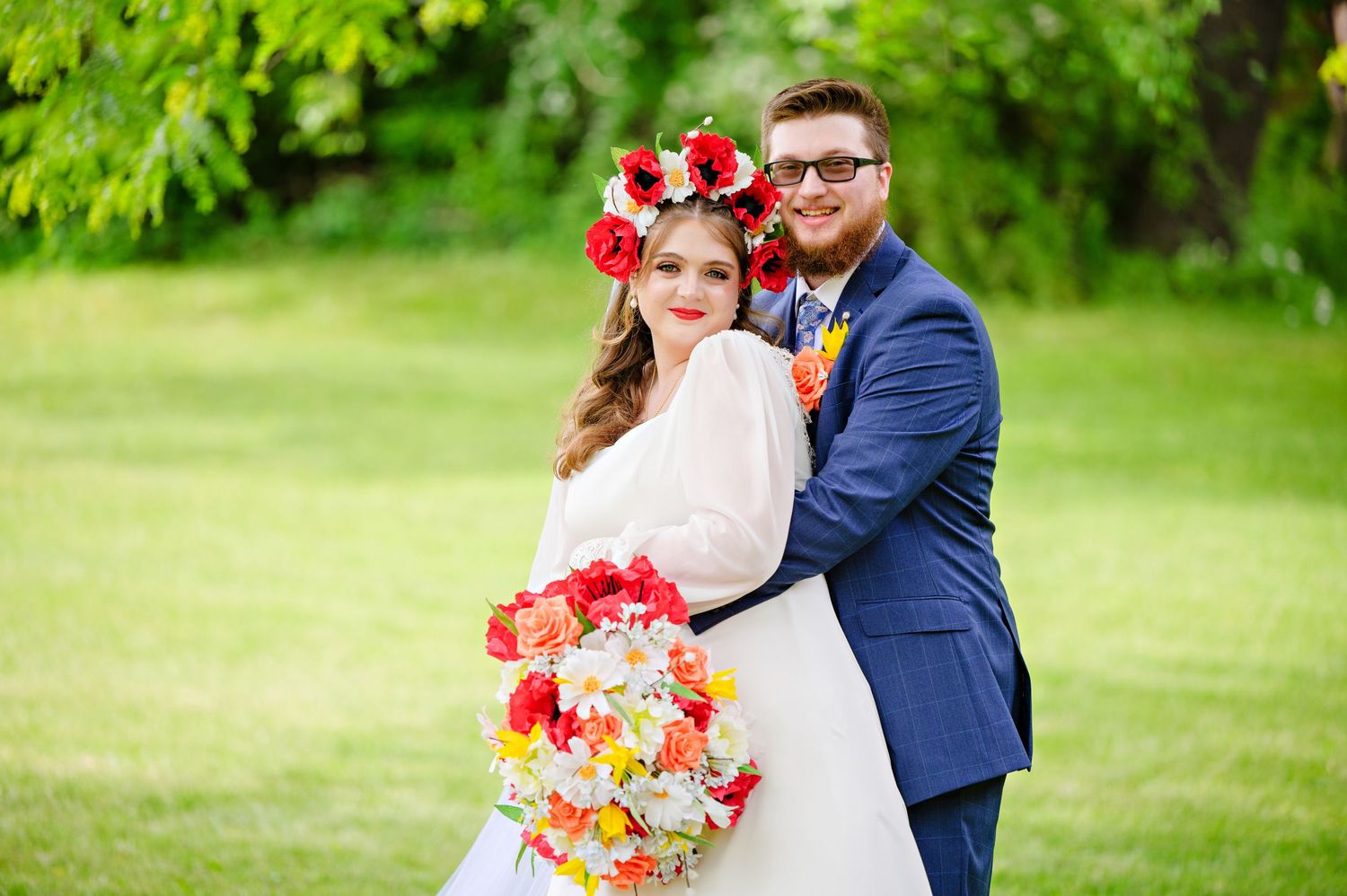 Bride and Groom posing before their wedding ceremony and reception at St. Nicholas Orthodox Church in Mogadore Ohio in May.