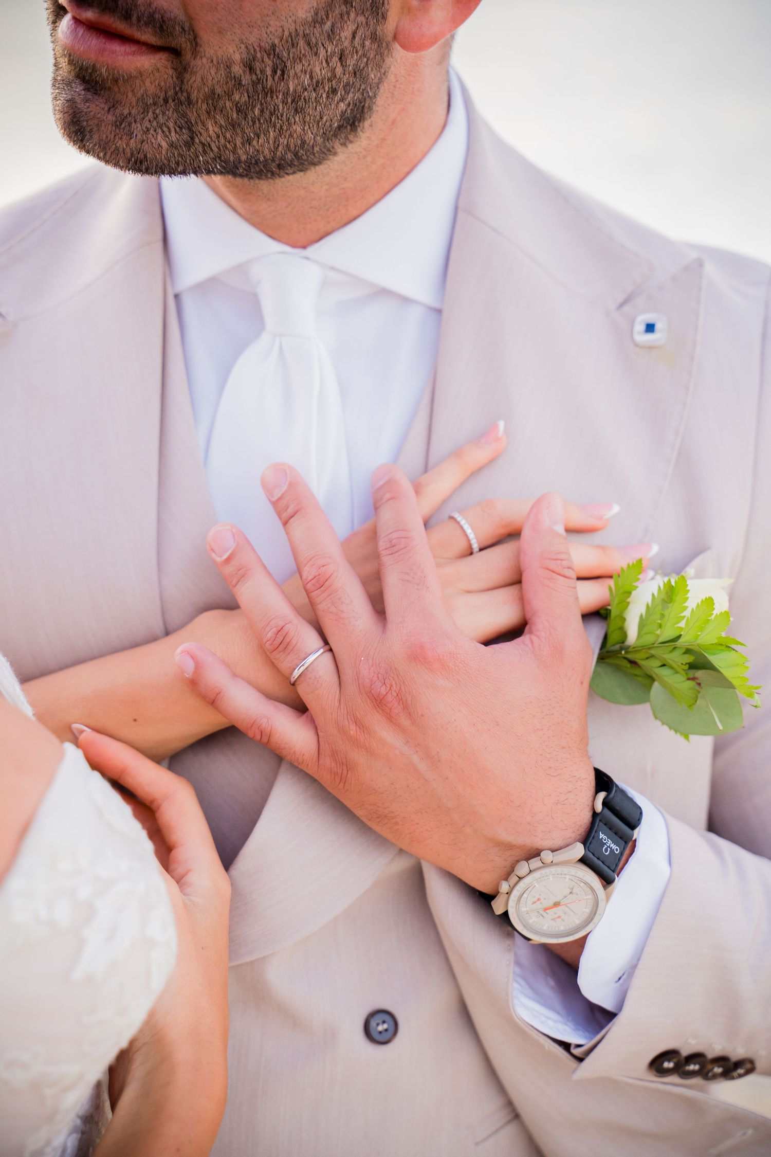 Close up of bride and groom hands showing wedding rings during a Mauritius destination wedding, Luminair Studio