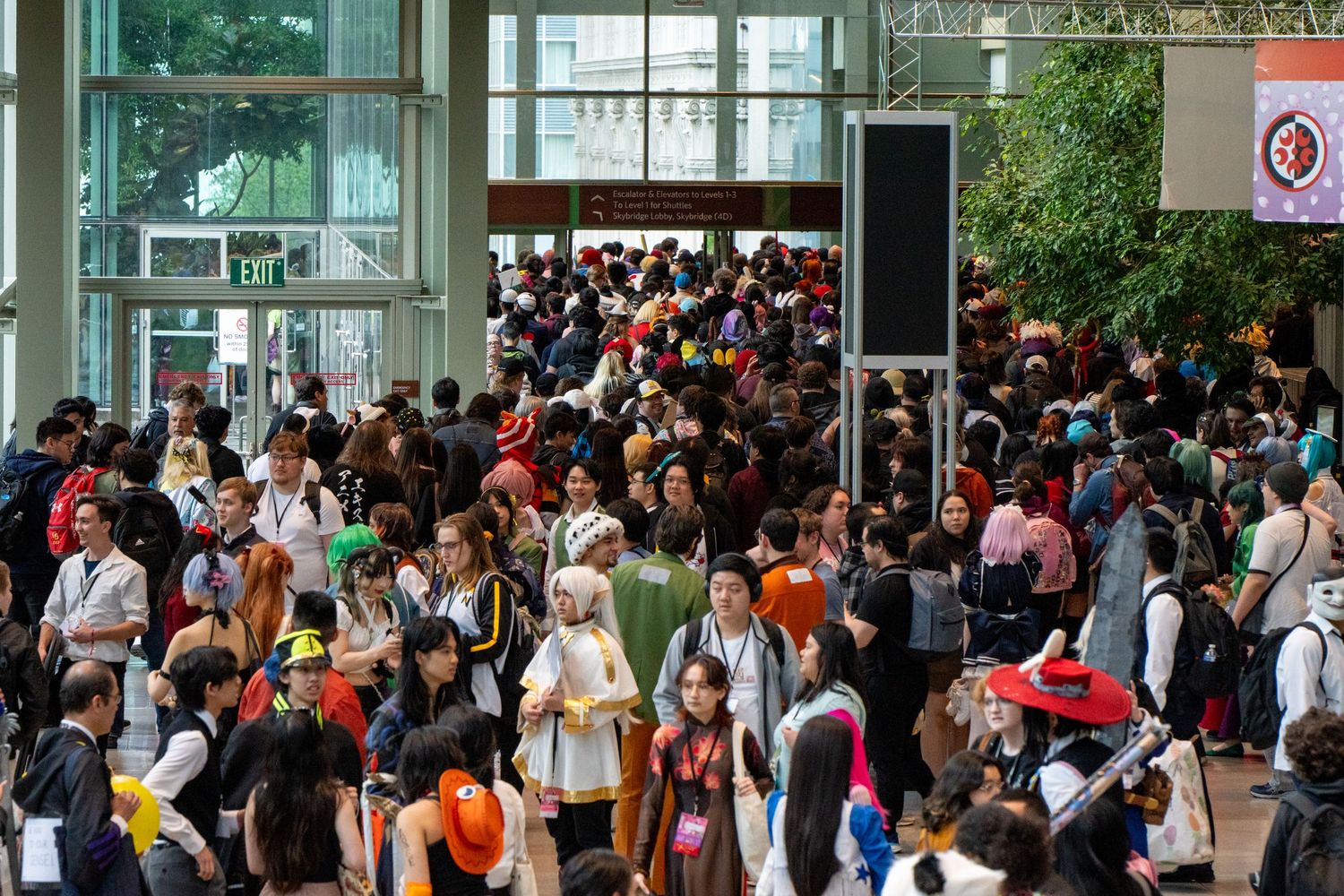 Crowd of attendees at the Seattle Convention Center during SakuraCon, photographed by Ted Warner Photography.