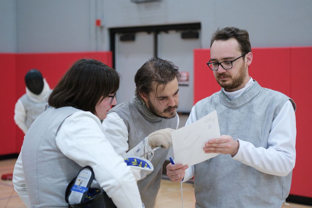 Members of the Fencing Club at Northern Illinois University in Dekalb, IL participate in a fencing tournament against other schools.