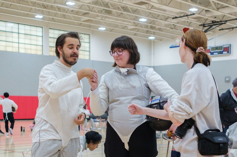 Members of the Fencing Club at Northern Illinois University in Dekalb, IL participate in a fencing tournament against other schools.